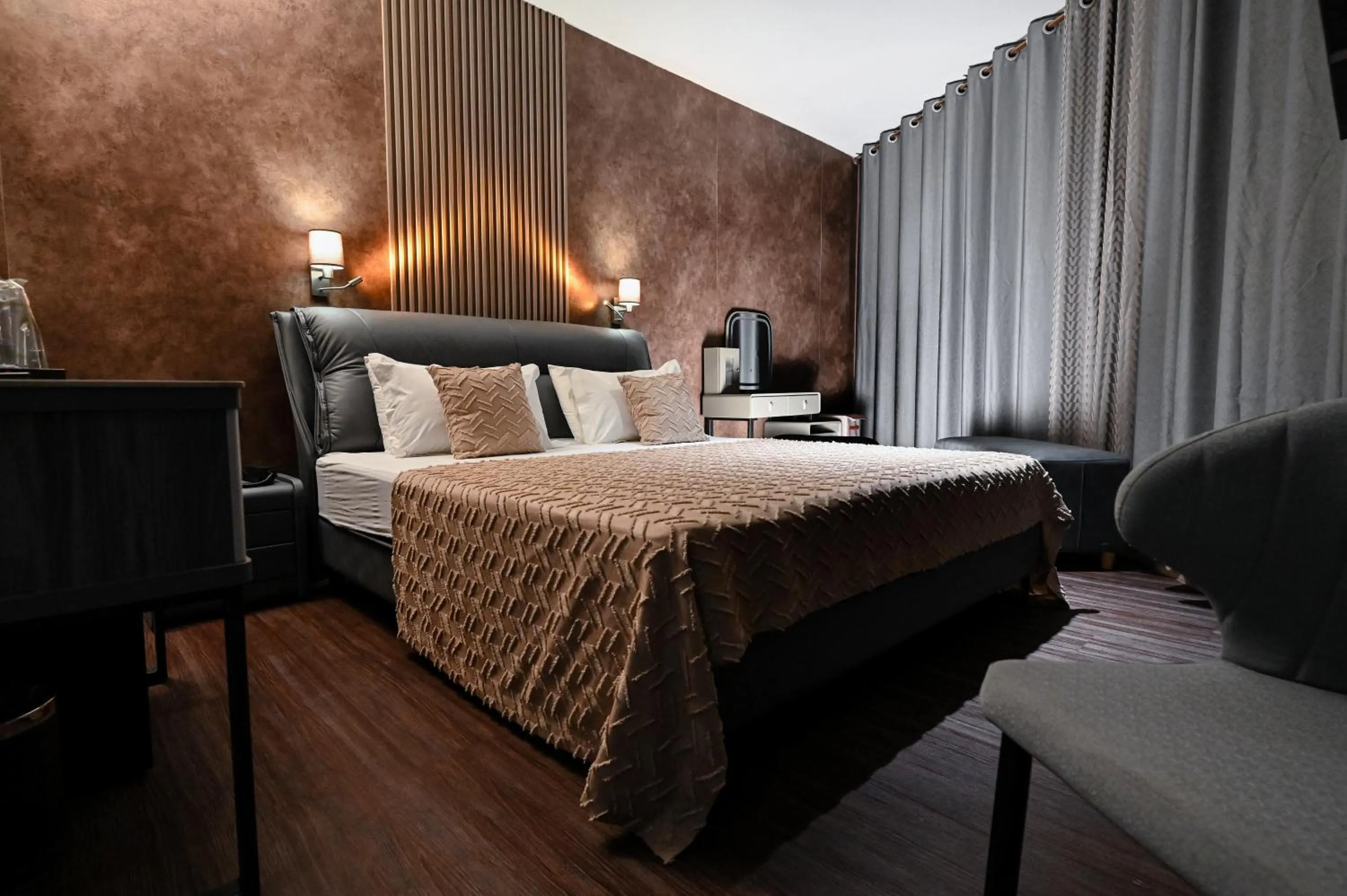 Bed in Grey Star Hotel