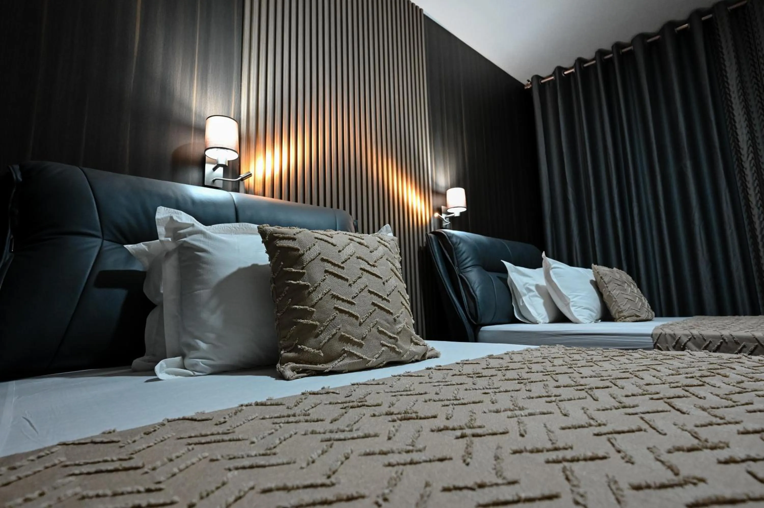 Bed in Grey Star Hotel