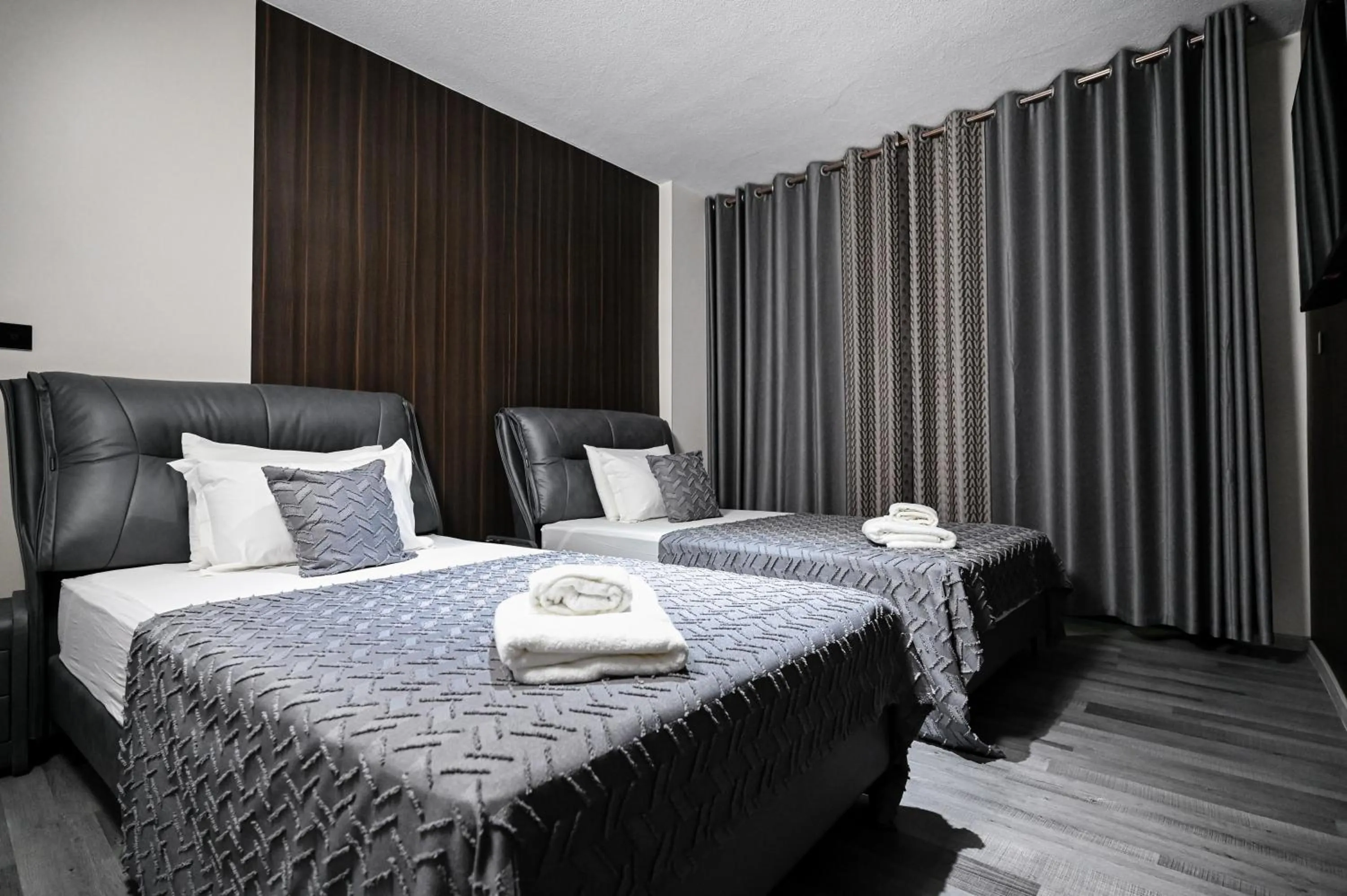 Bed in Grey Star Hotel