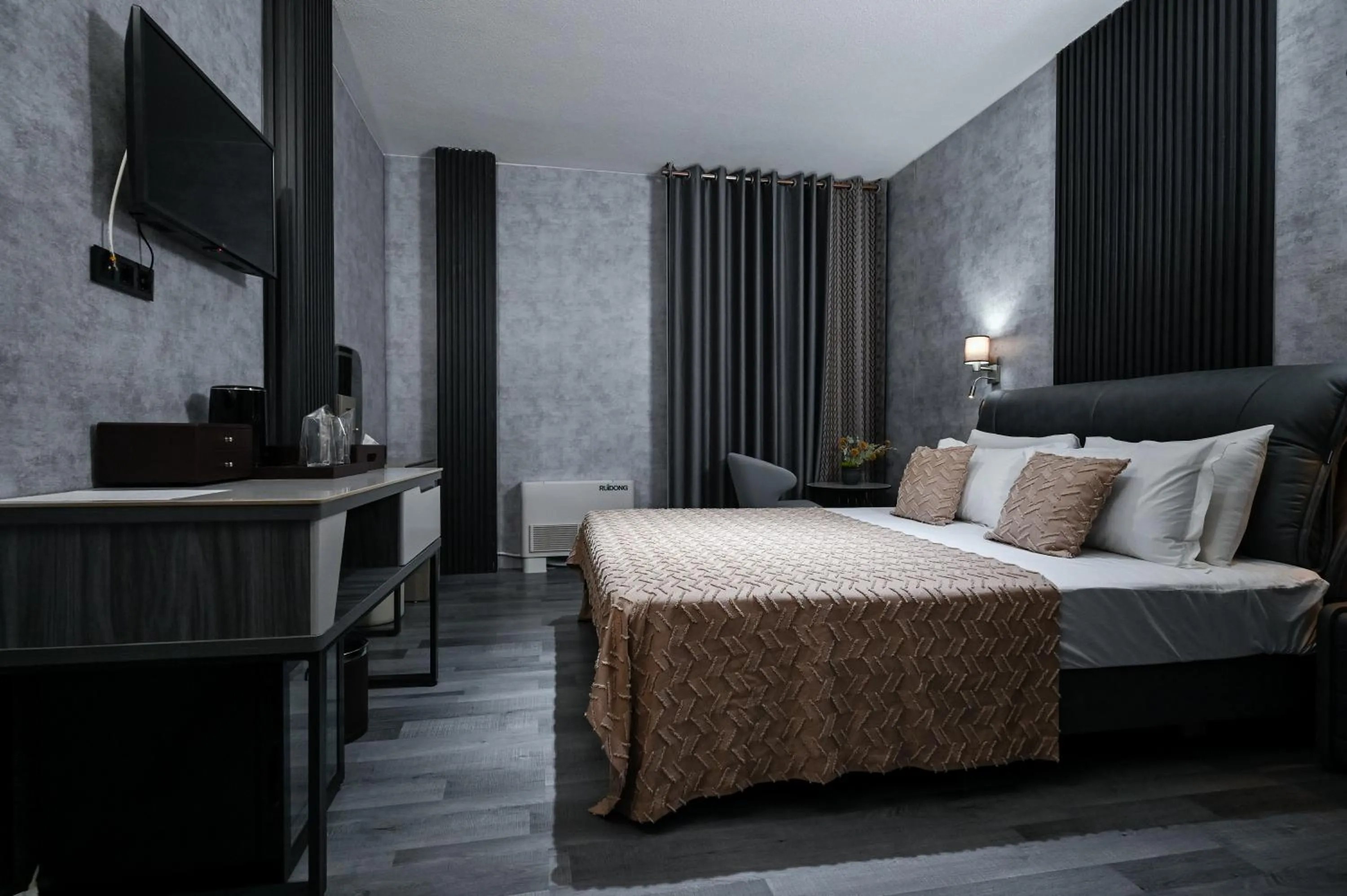 Bed in Grey Star Hotel