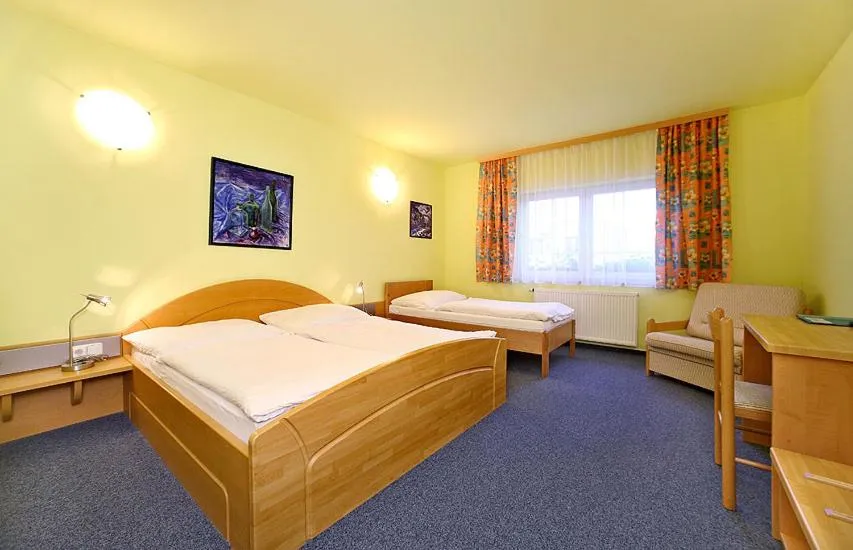Bed in HOTEL RAJSKY
