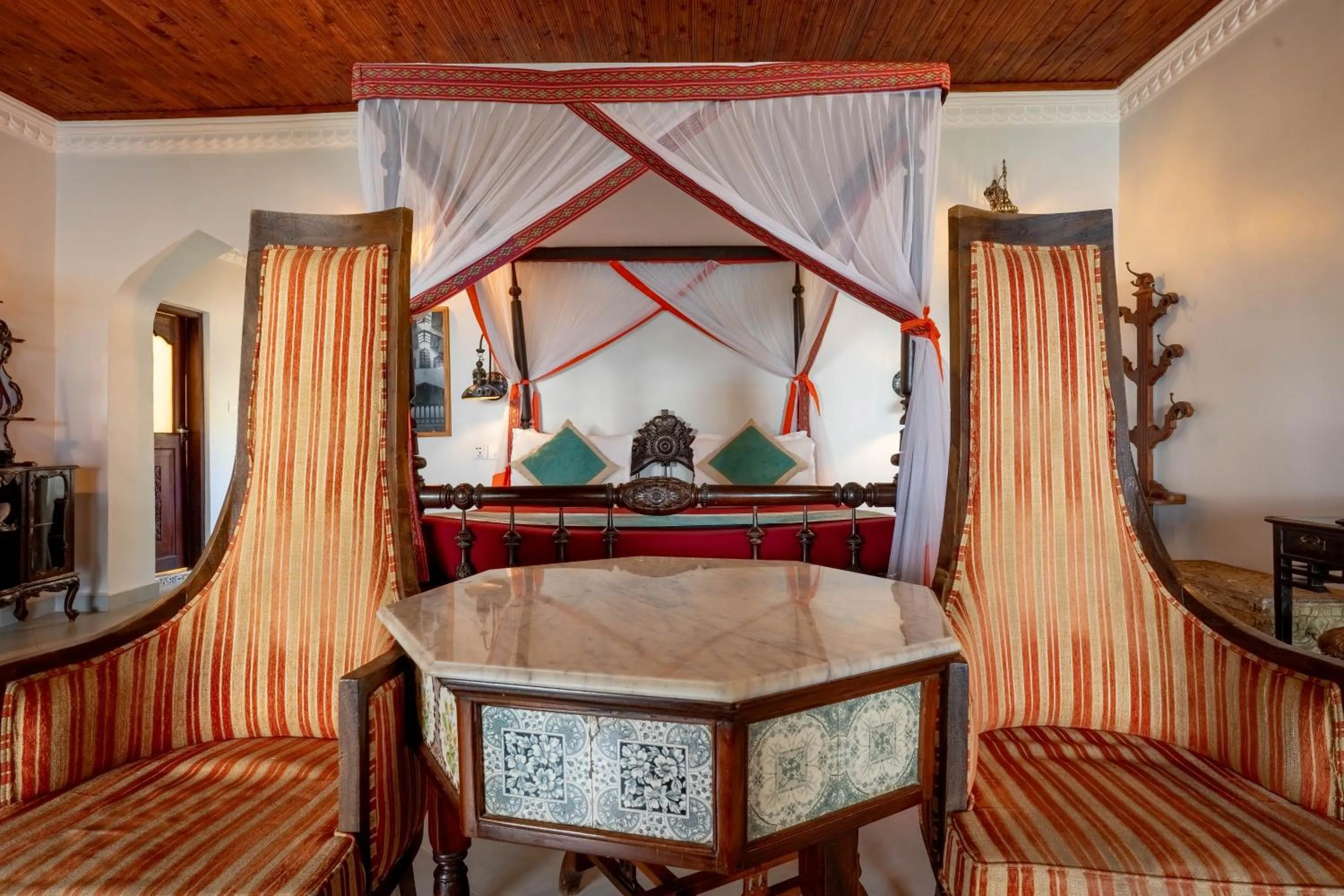 Seating area, Bed in Mizingani Seafront Hotel