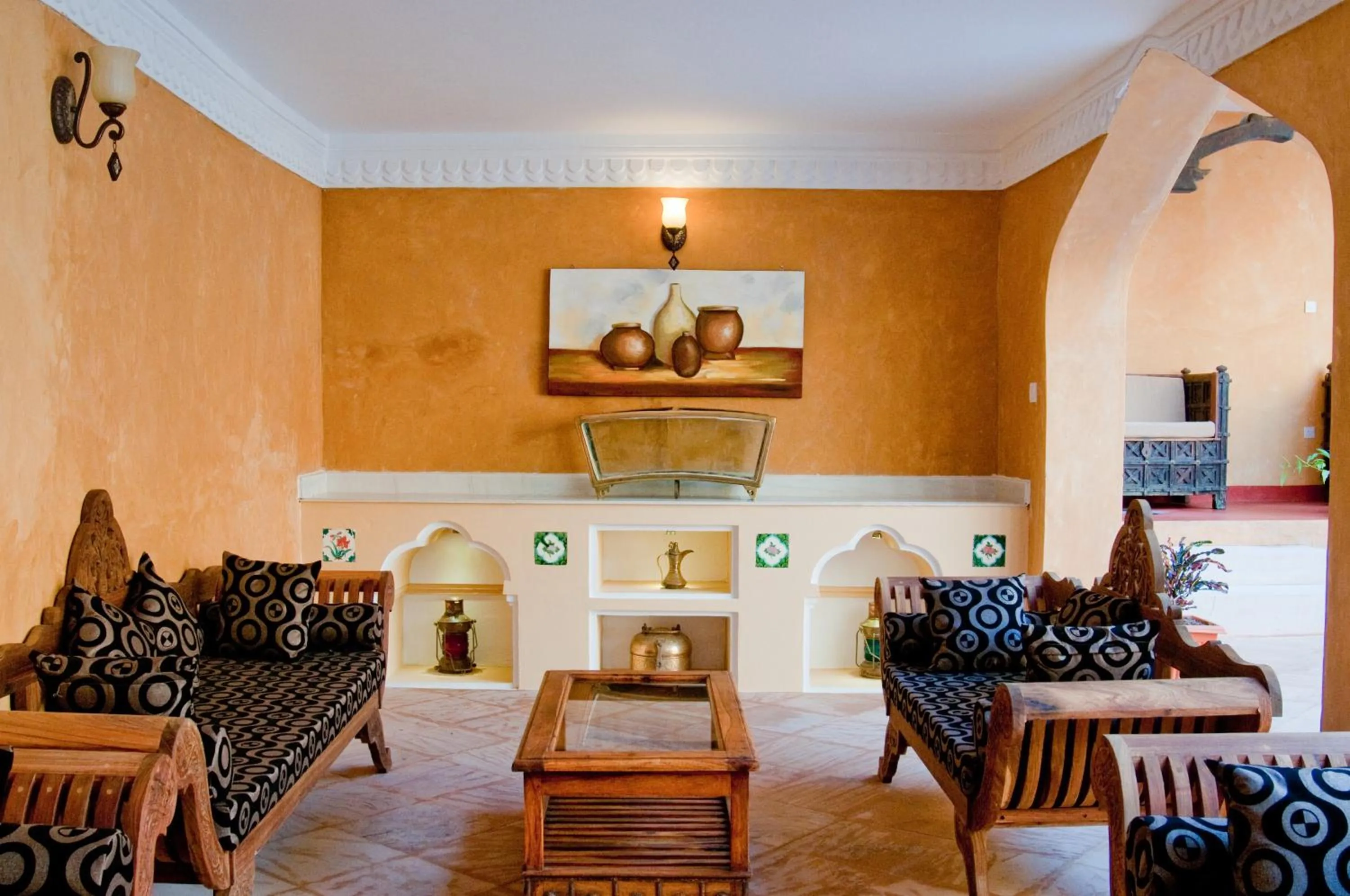 Communal lounge/ TV room in Mizingani Seafront Hotel