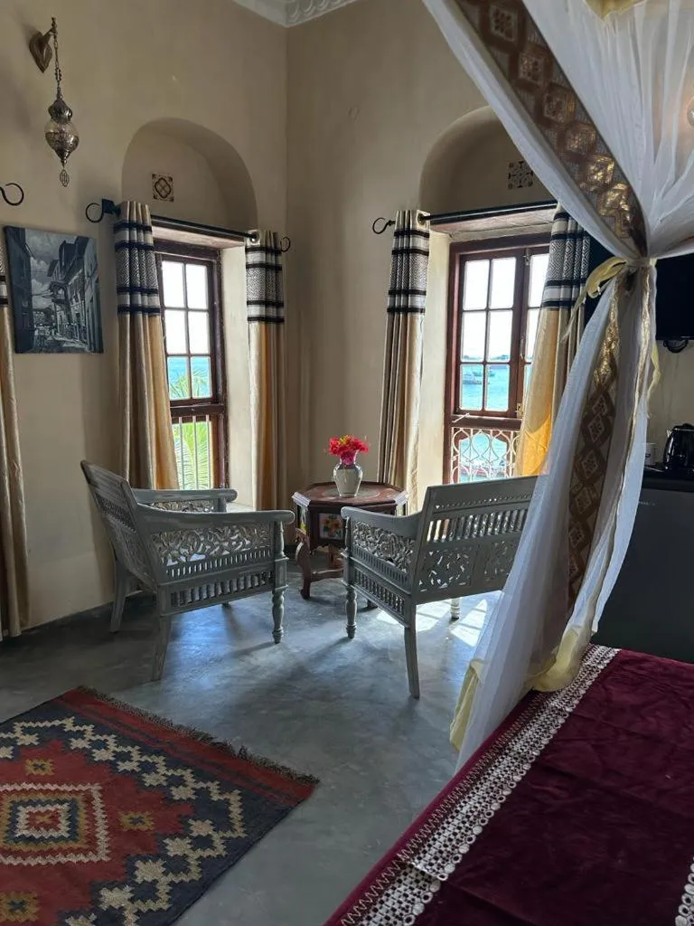 TV and multimedia, Bed in Mizingani Seafront Hotel