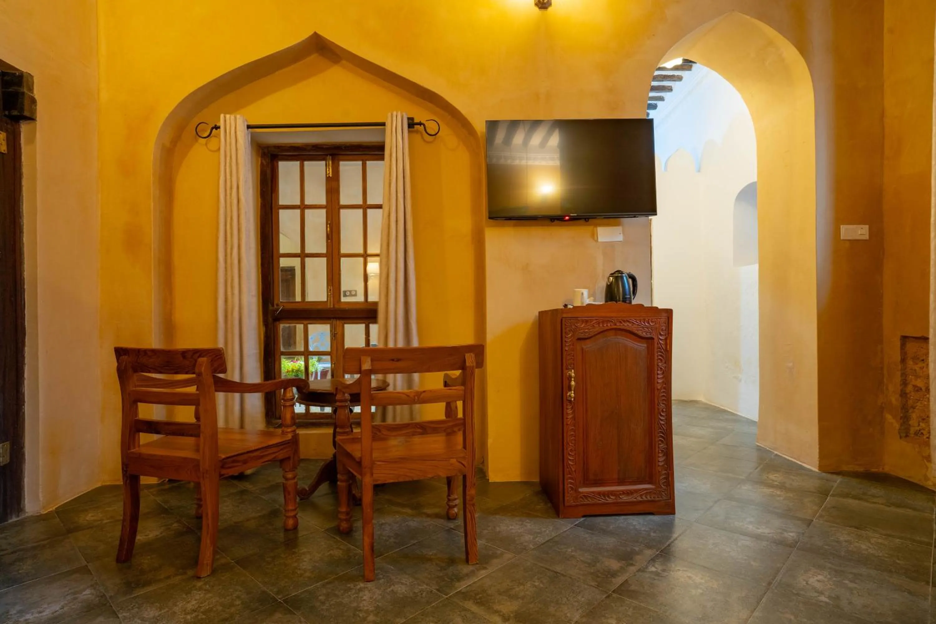 Communal lounge/ TV room in Mizingani Seafront Hotel