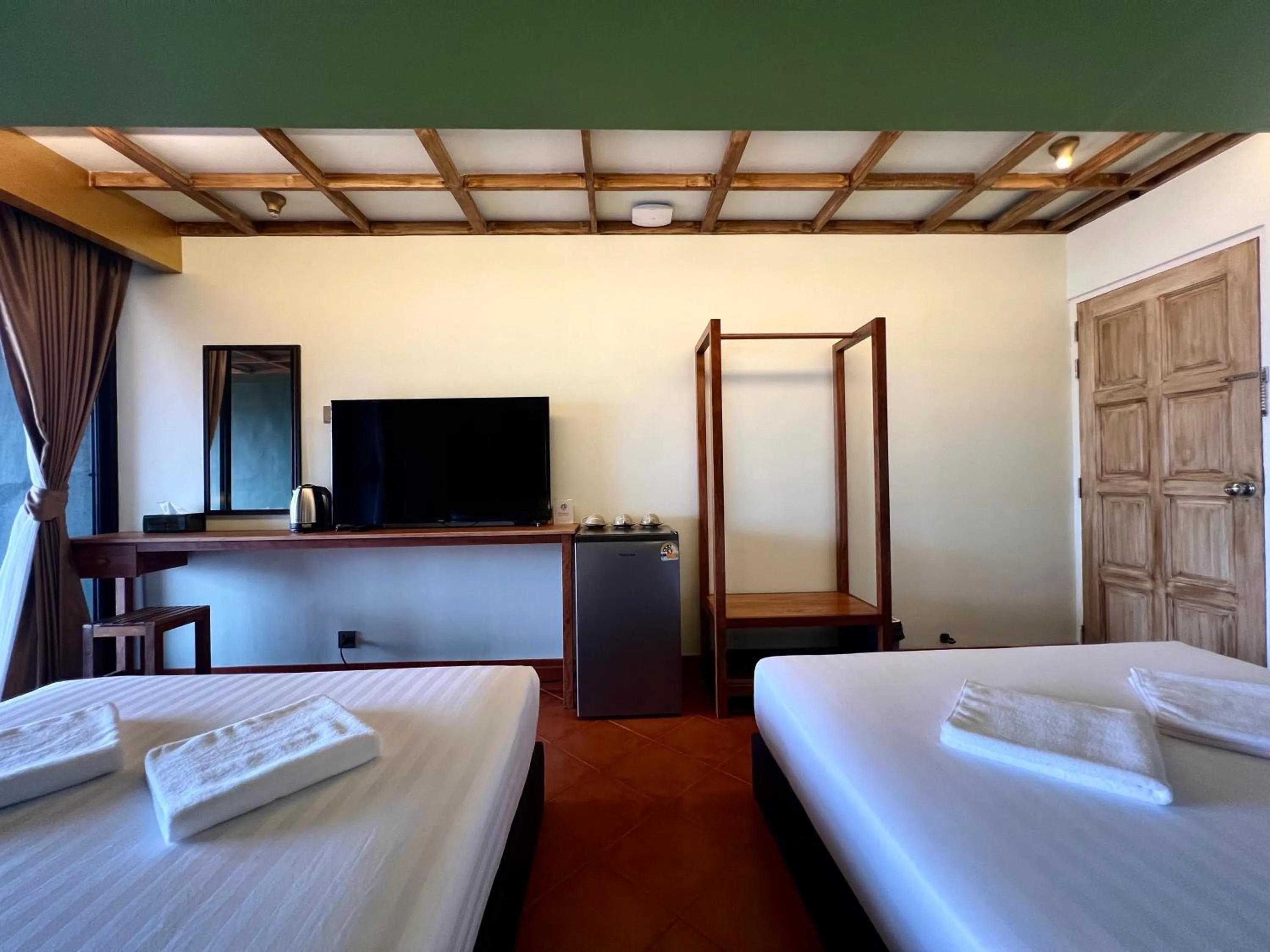 Bed in Cha Na Stay at Merry V
