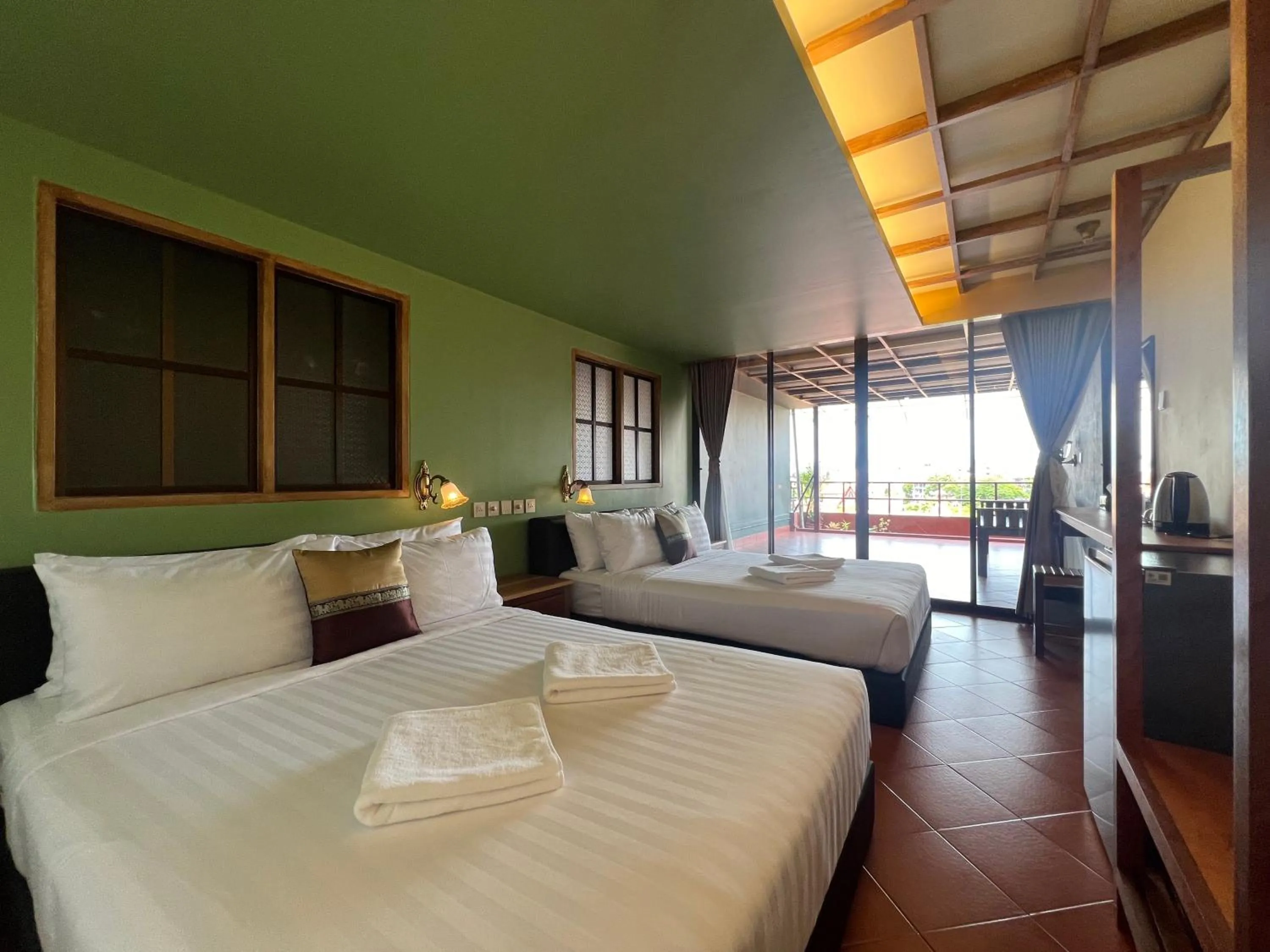 Bed in Cha Na Stay at Merry V