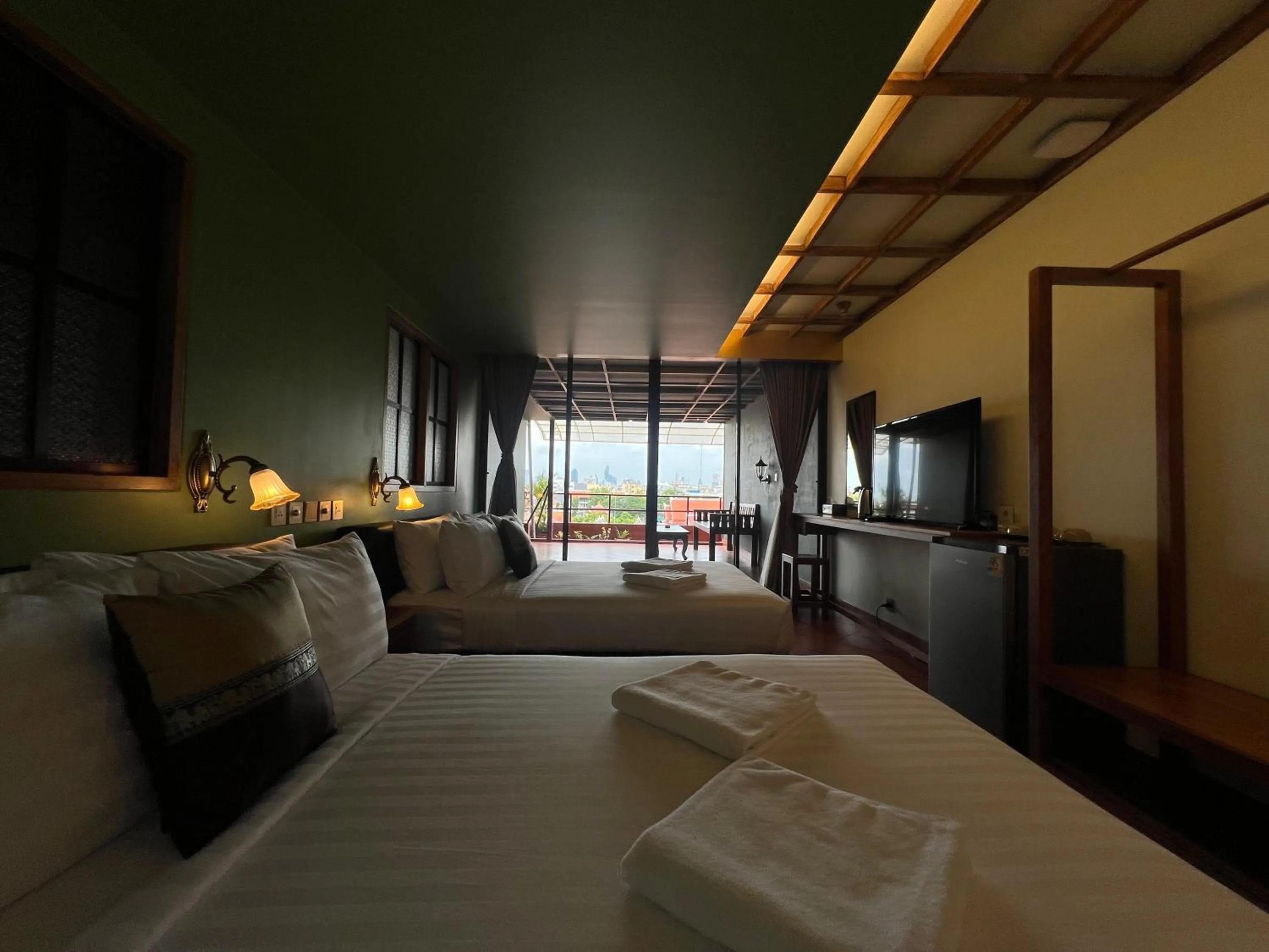 Bed in Cha Na Stay at Merry V
