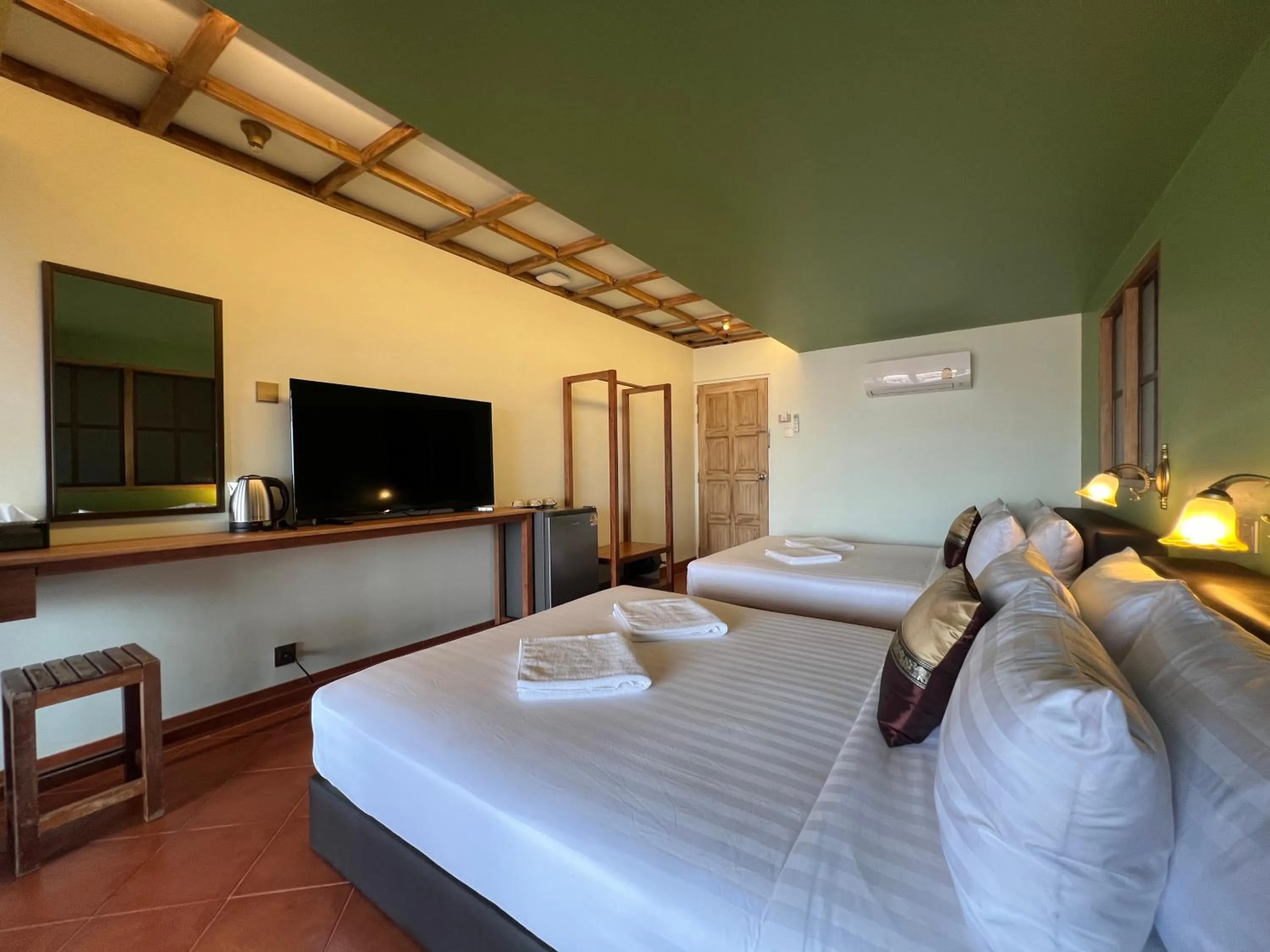 Bed in Cha Na Stay at Merry V