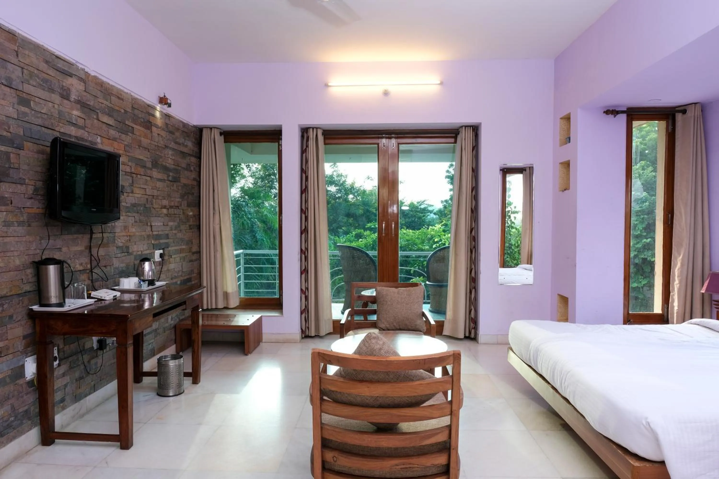 Dining area, Bed in The Chitvan Resort