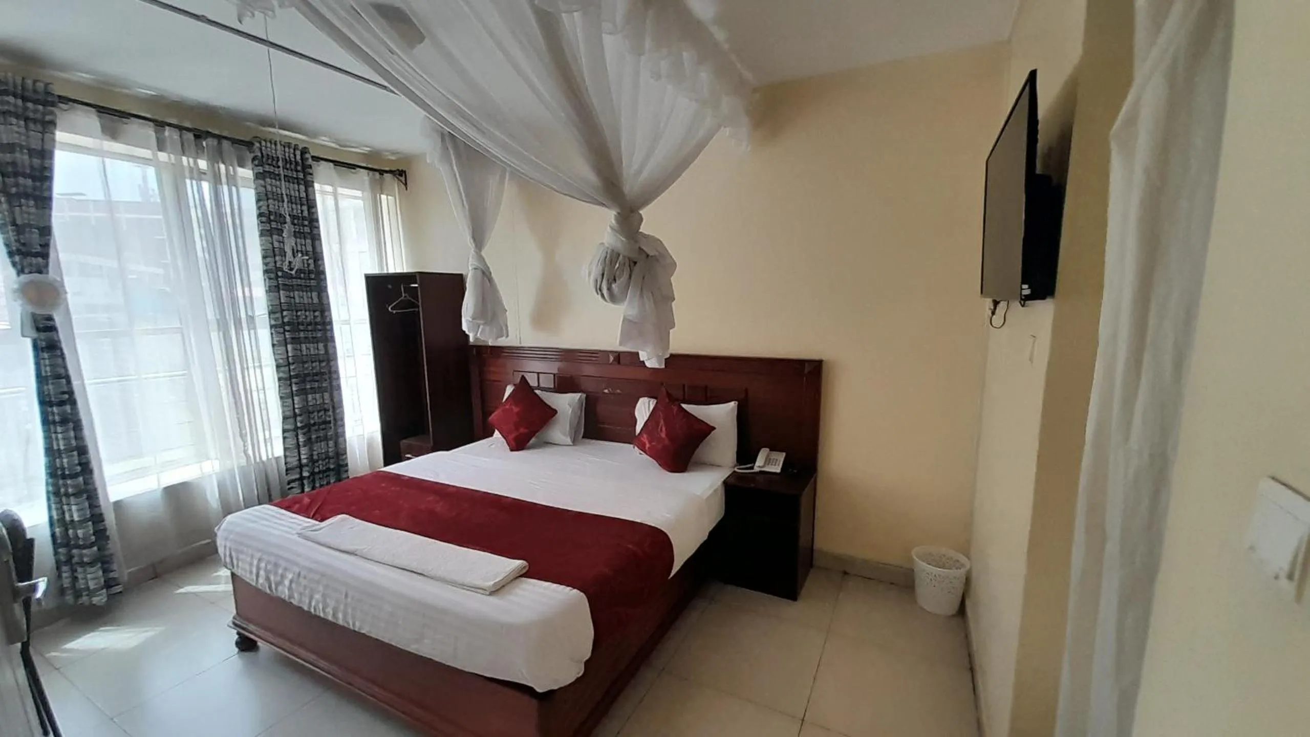 Bed in Epitome Times Hotel