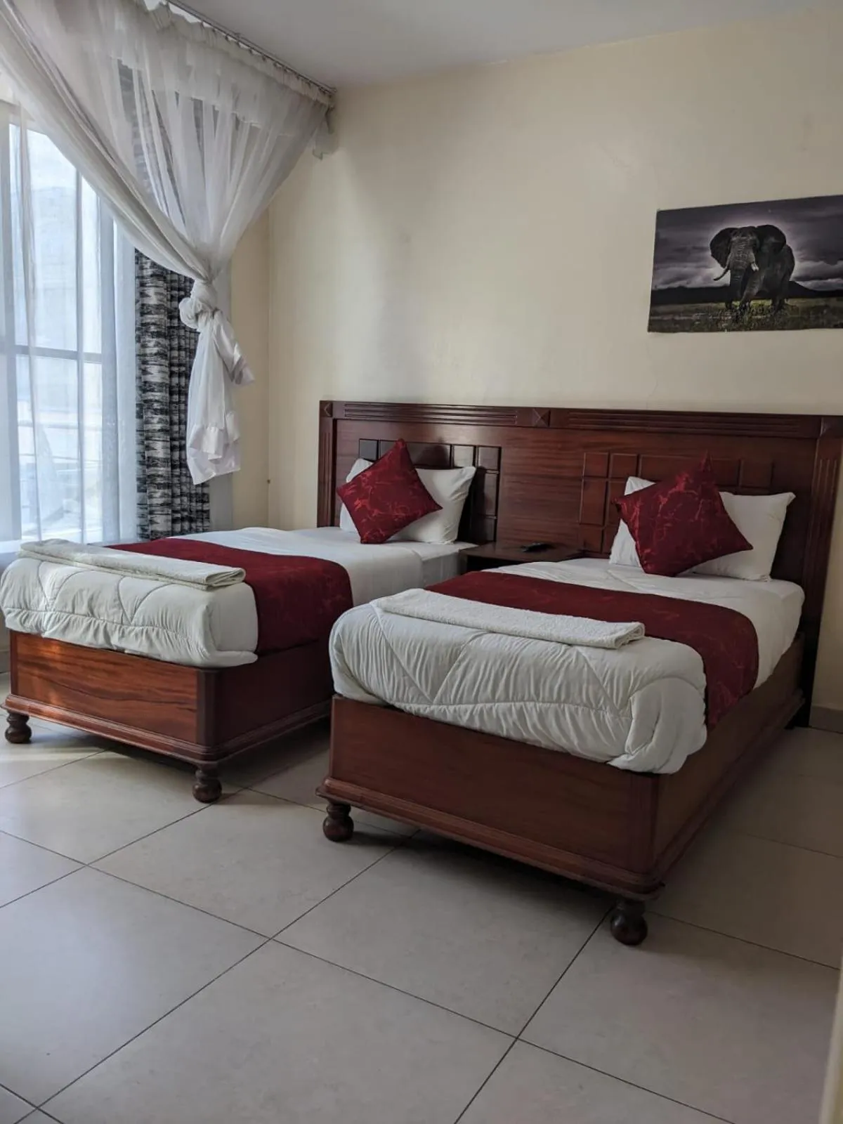 Bed in Epitome Times Hotel