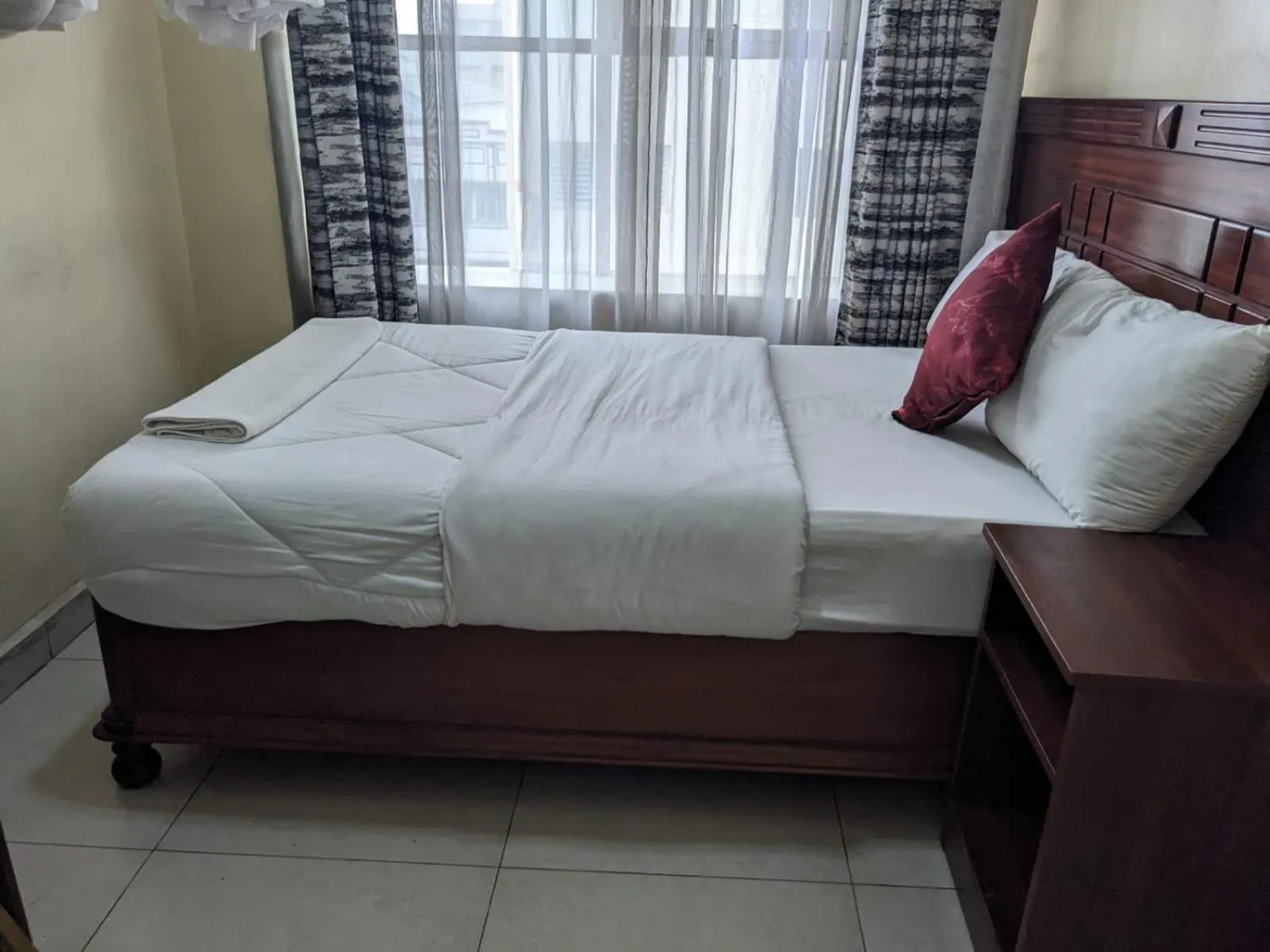 Bed in Epitome Times Hotel