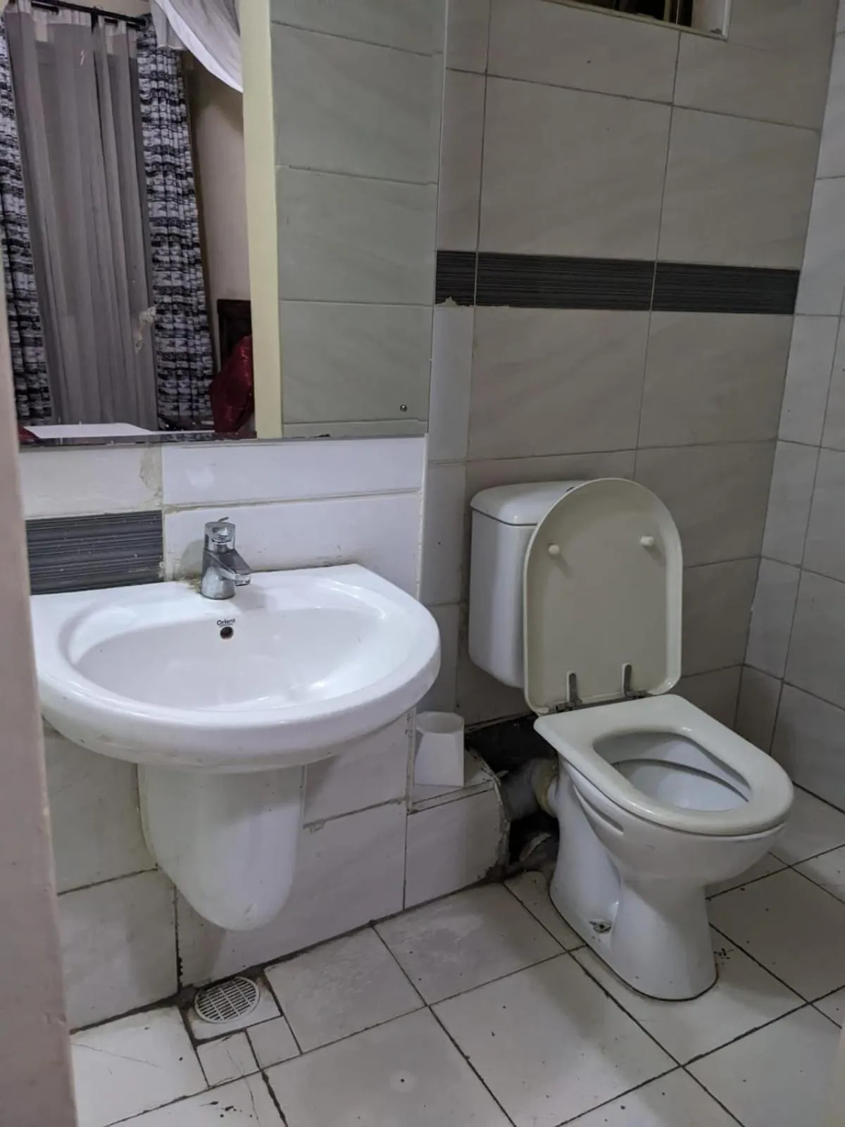 Toilet in Epitome Times Hotel