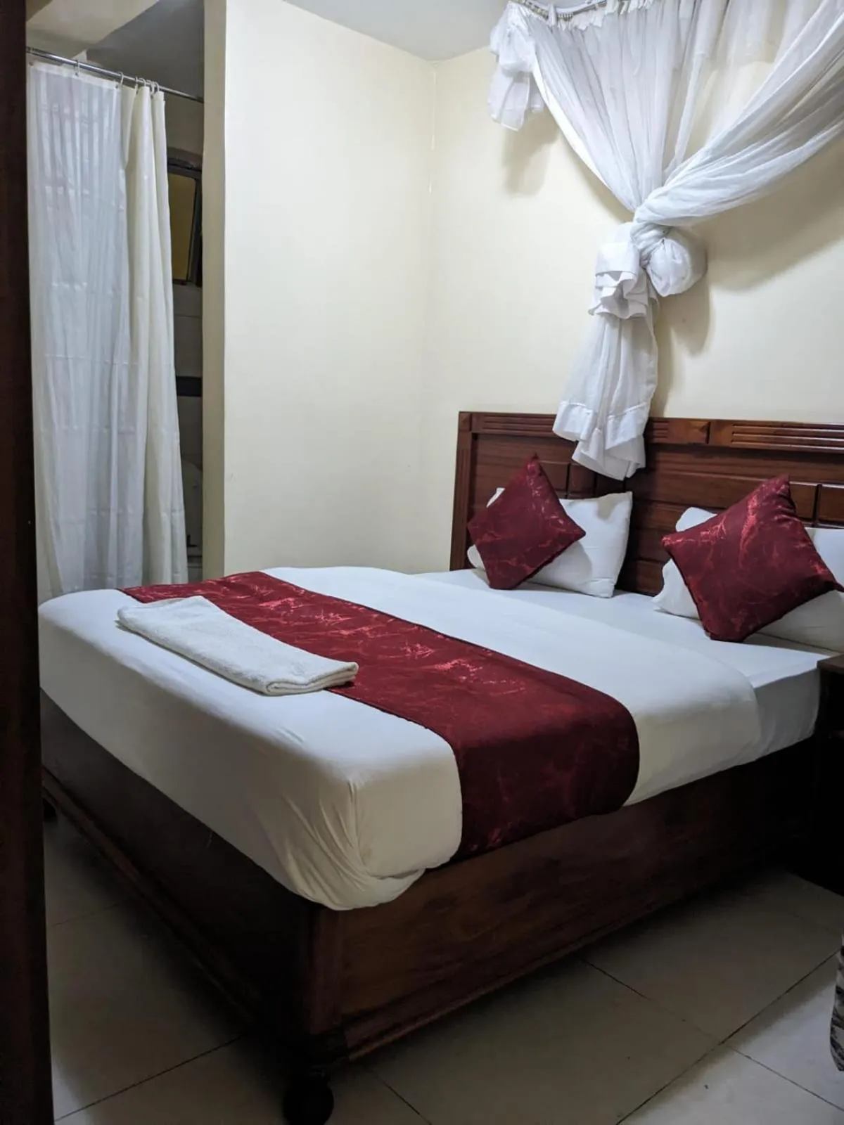 Bed in Epitome Times Hotel