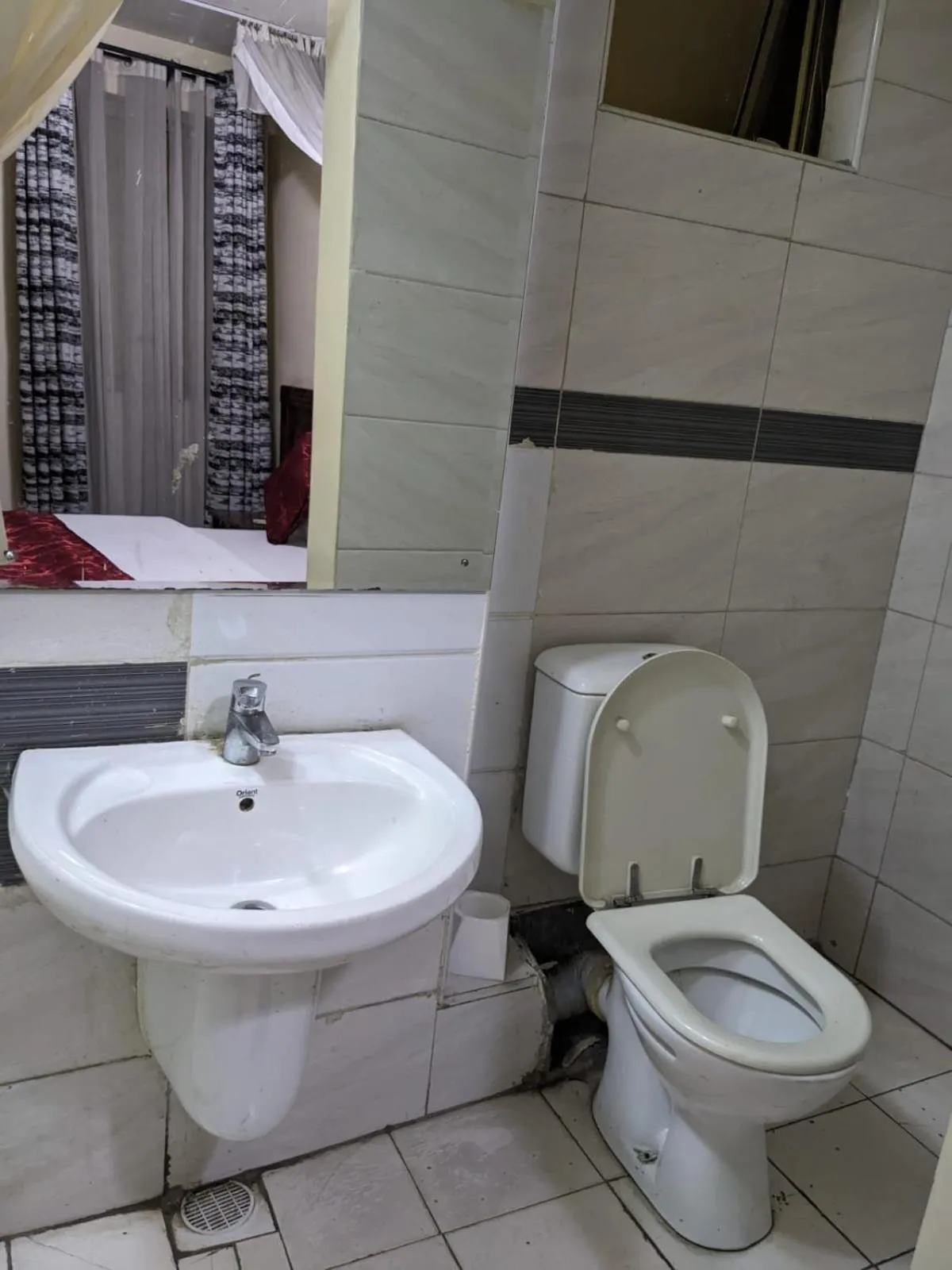 Toilet in Epitome Times Hotel