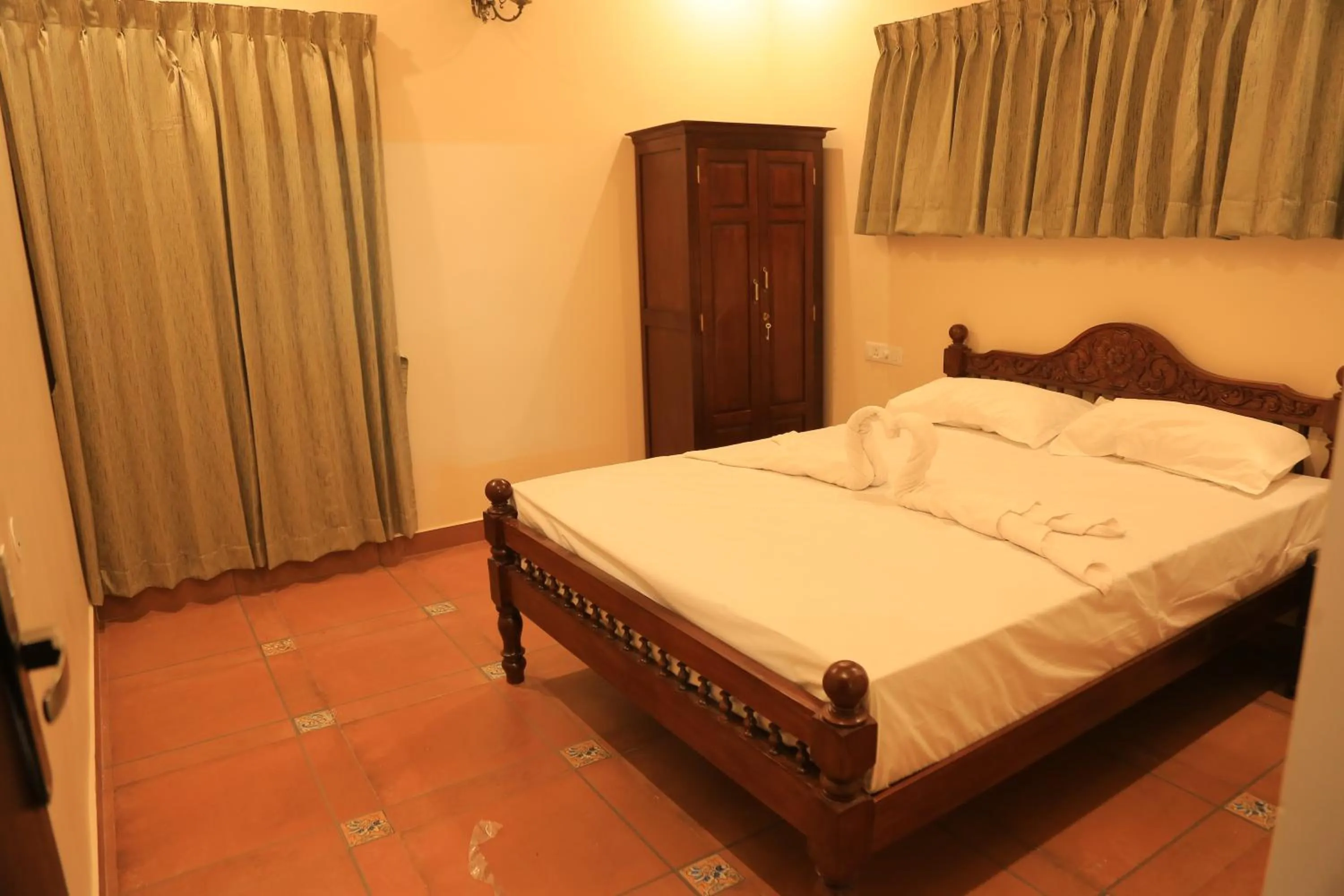Bed in Ponni Homestay Kumbakonam