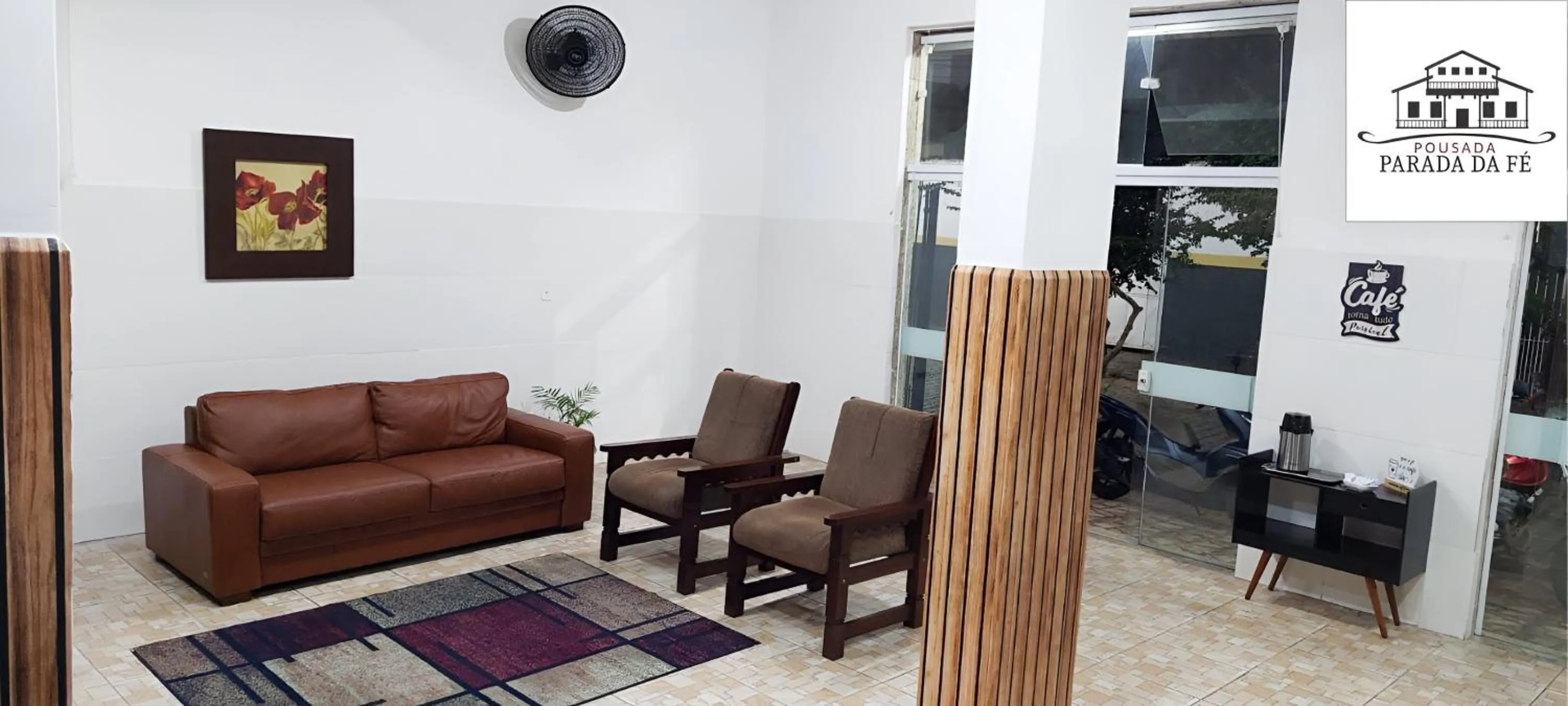 Communal lounge/ TV room in Pousada Parada Da Fé