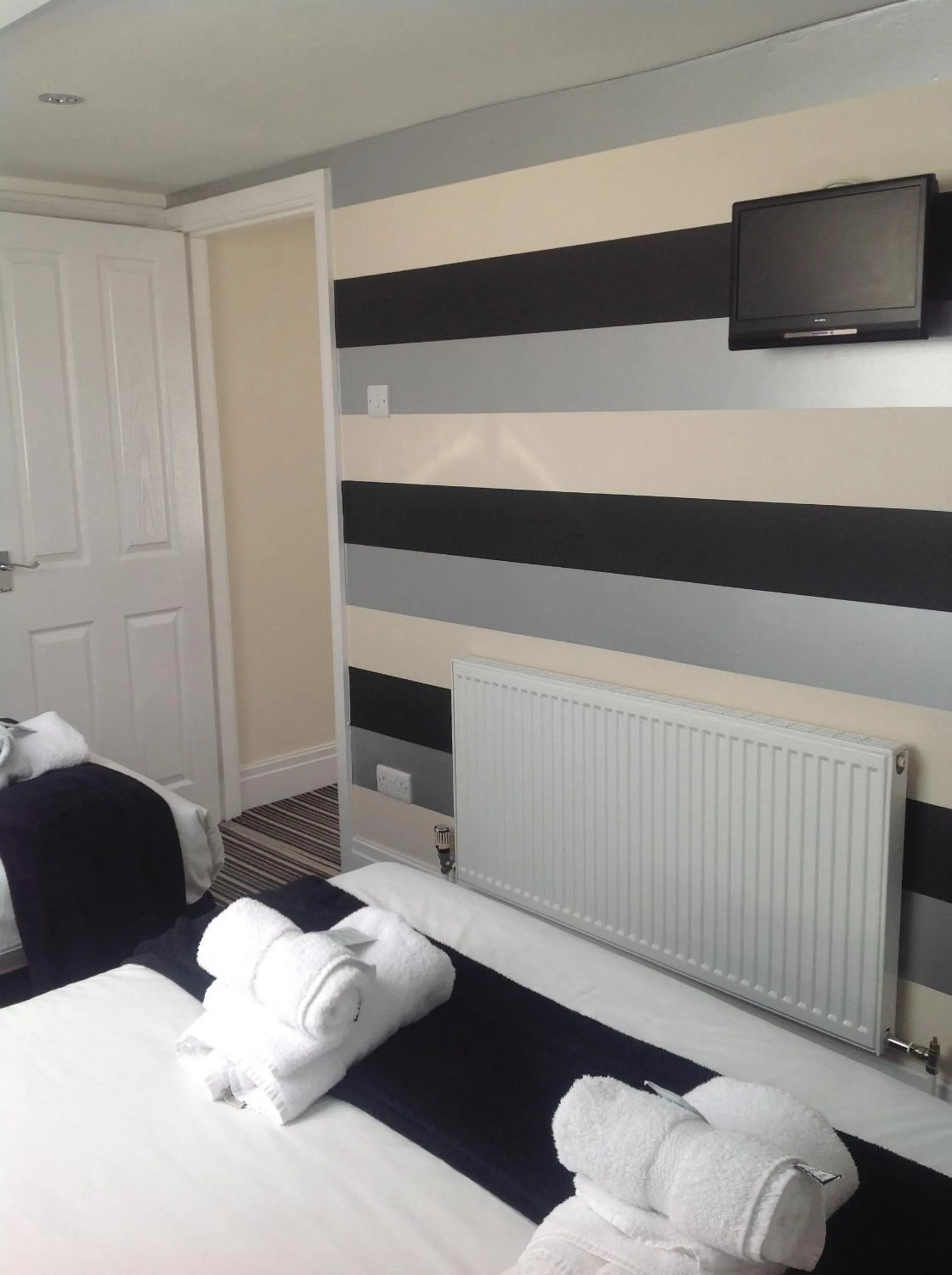 Decorative detail, Bed in Happy Return Hotel