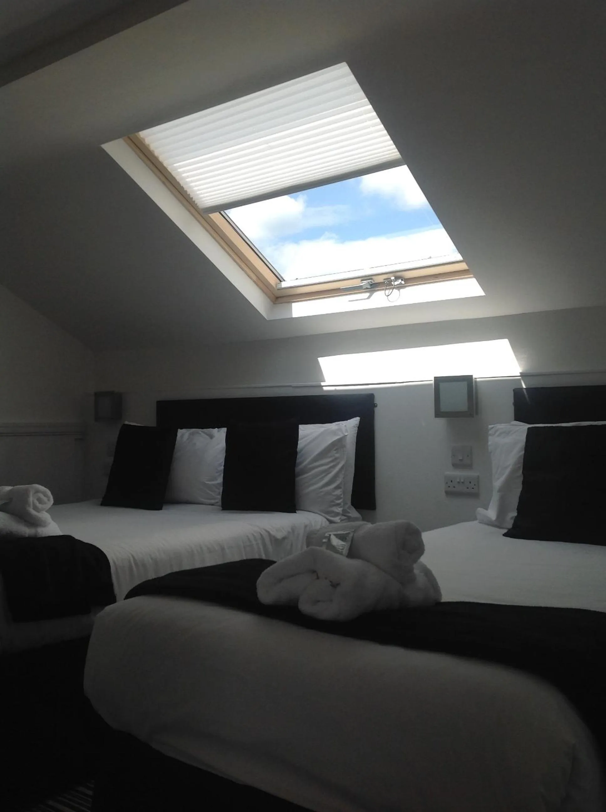 Bed in Happy Return Hotel