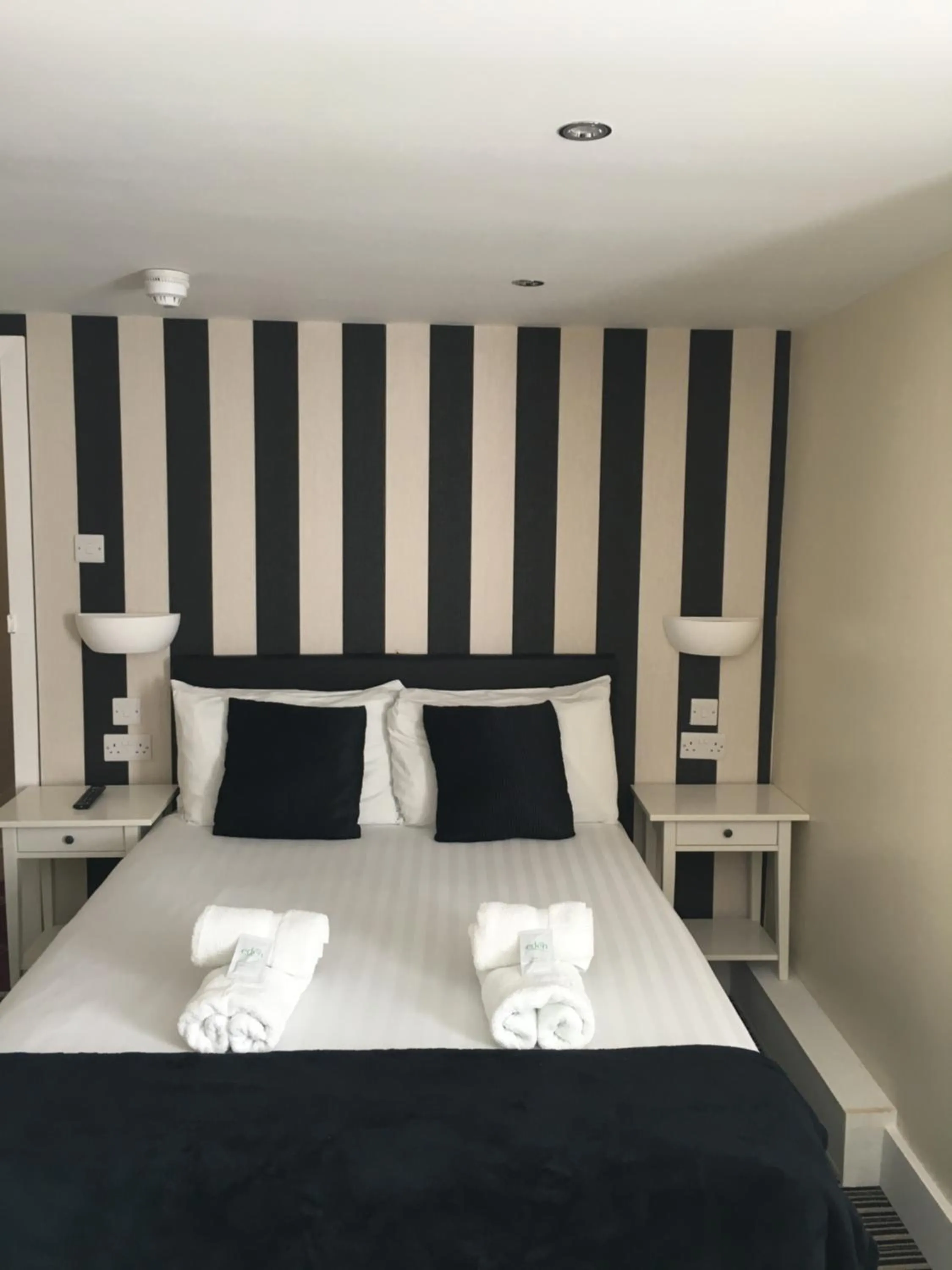 Bed in Happy Return Hotel