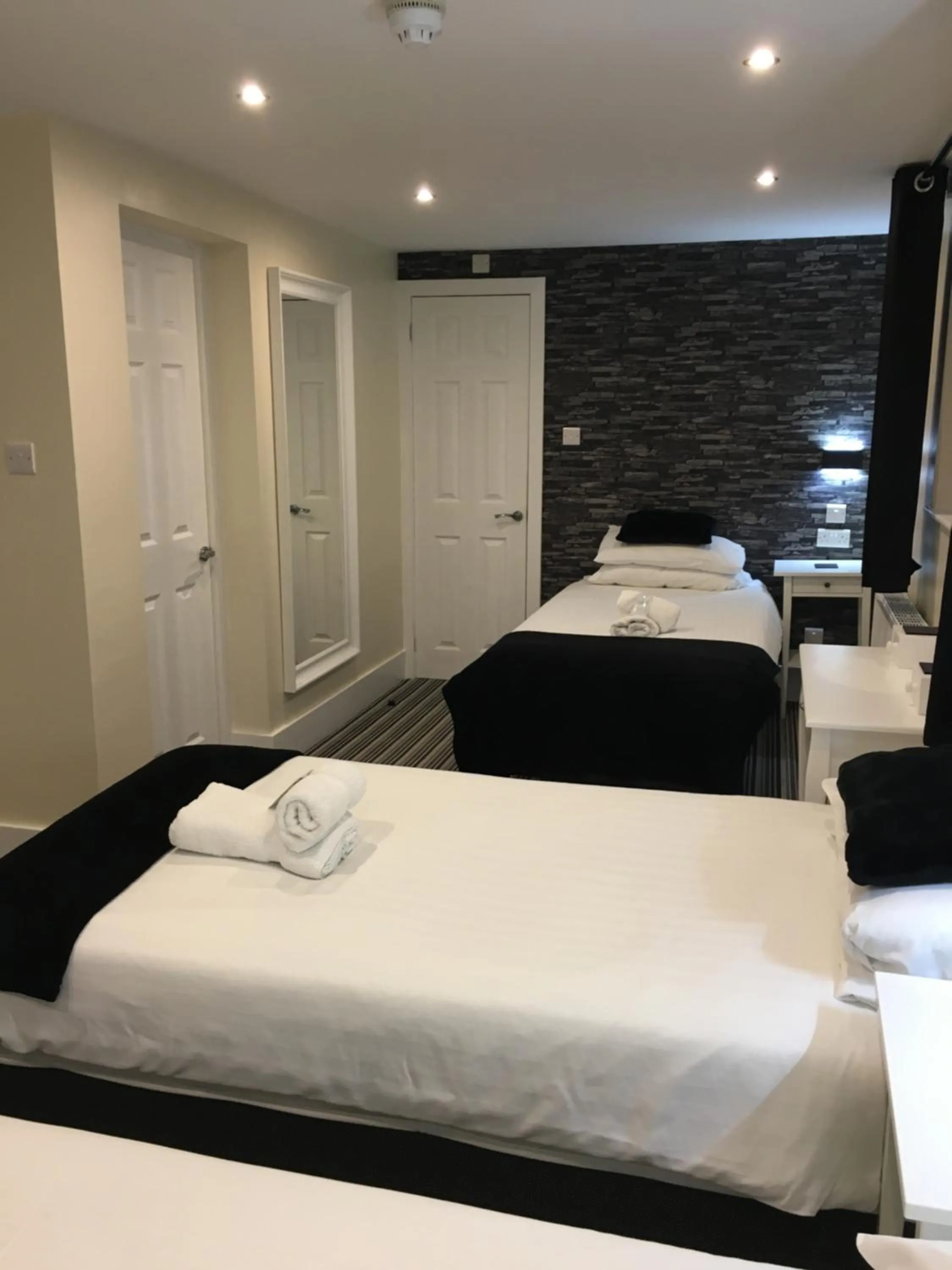 Bedroom, Bed in Happy Return Hotel