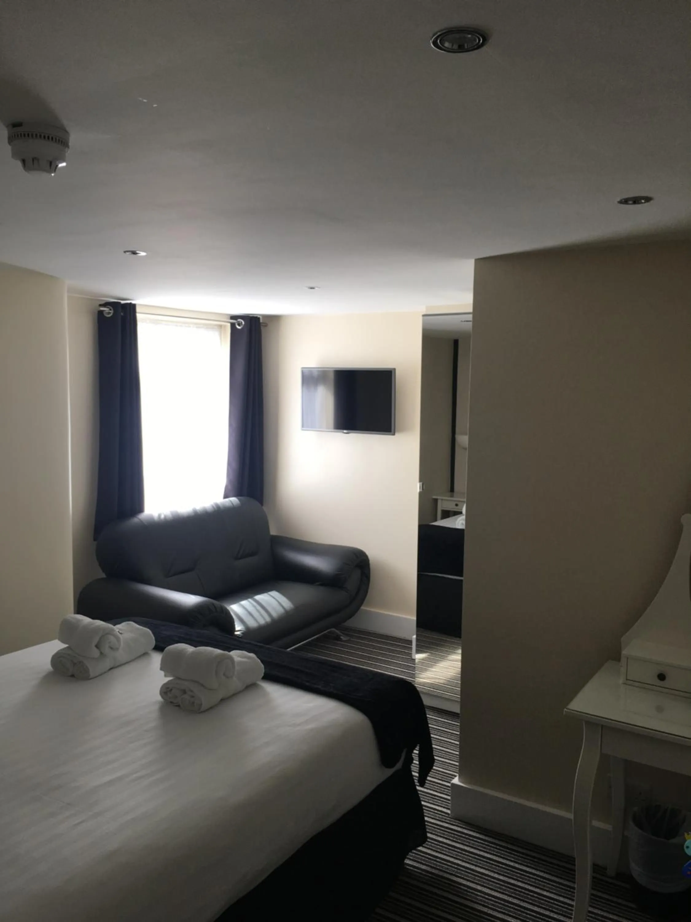 Bed in Happy Return Hotel