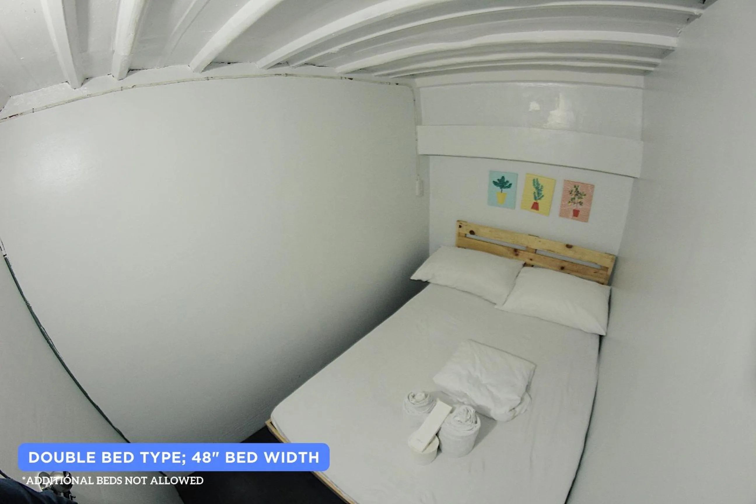 Bed in Dickem's Transient House