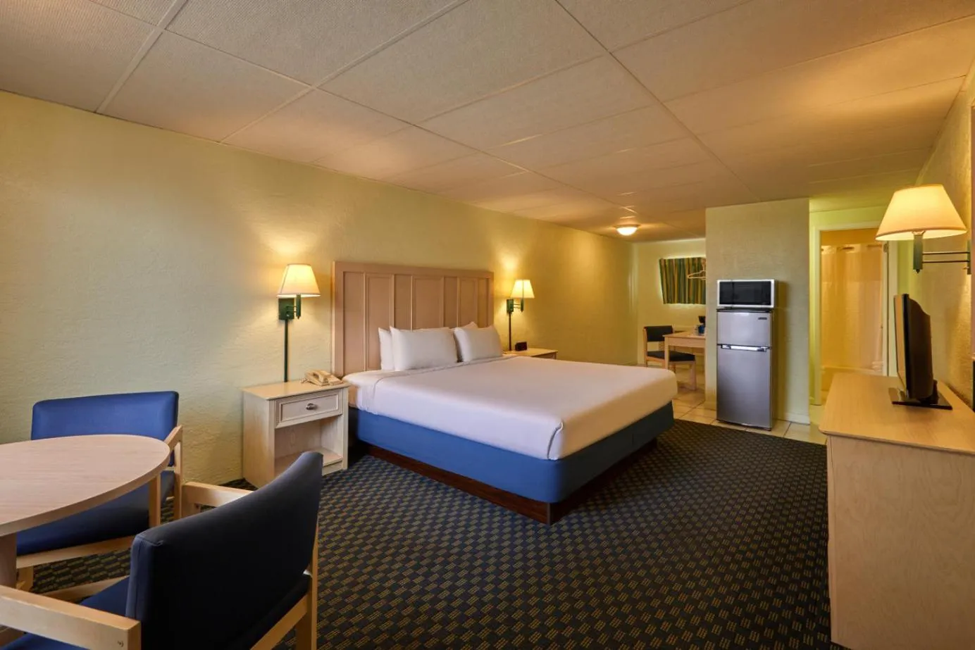 Bed in Palmetto Beachfront Hotel, a By The Sea Resort