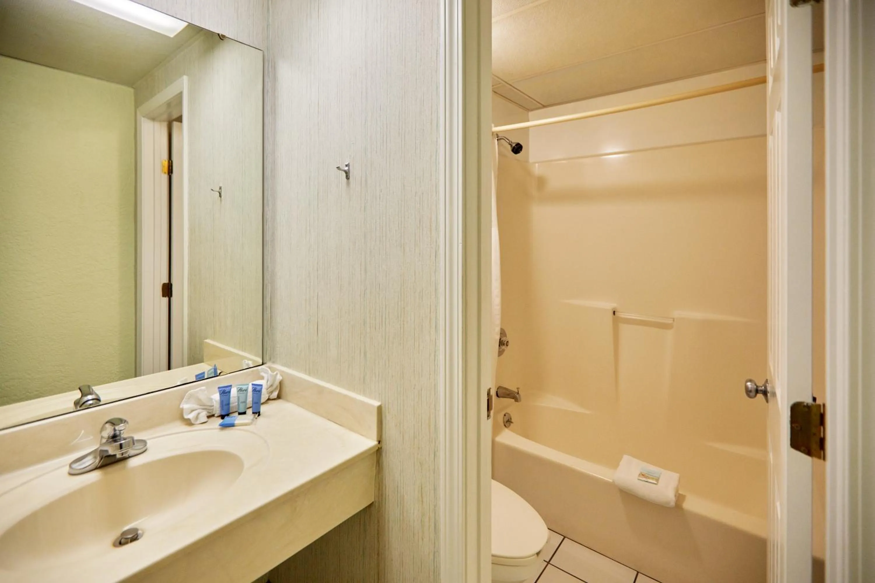 Bathroom in Palmetto Beachfront Hotel, a By The Sea Resort