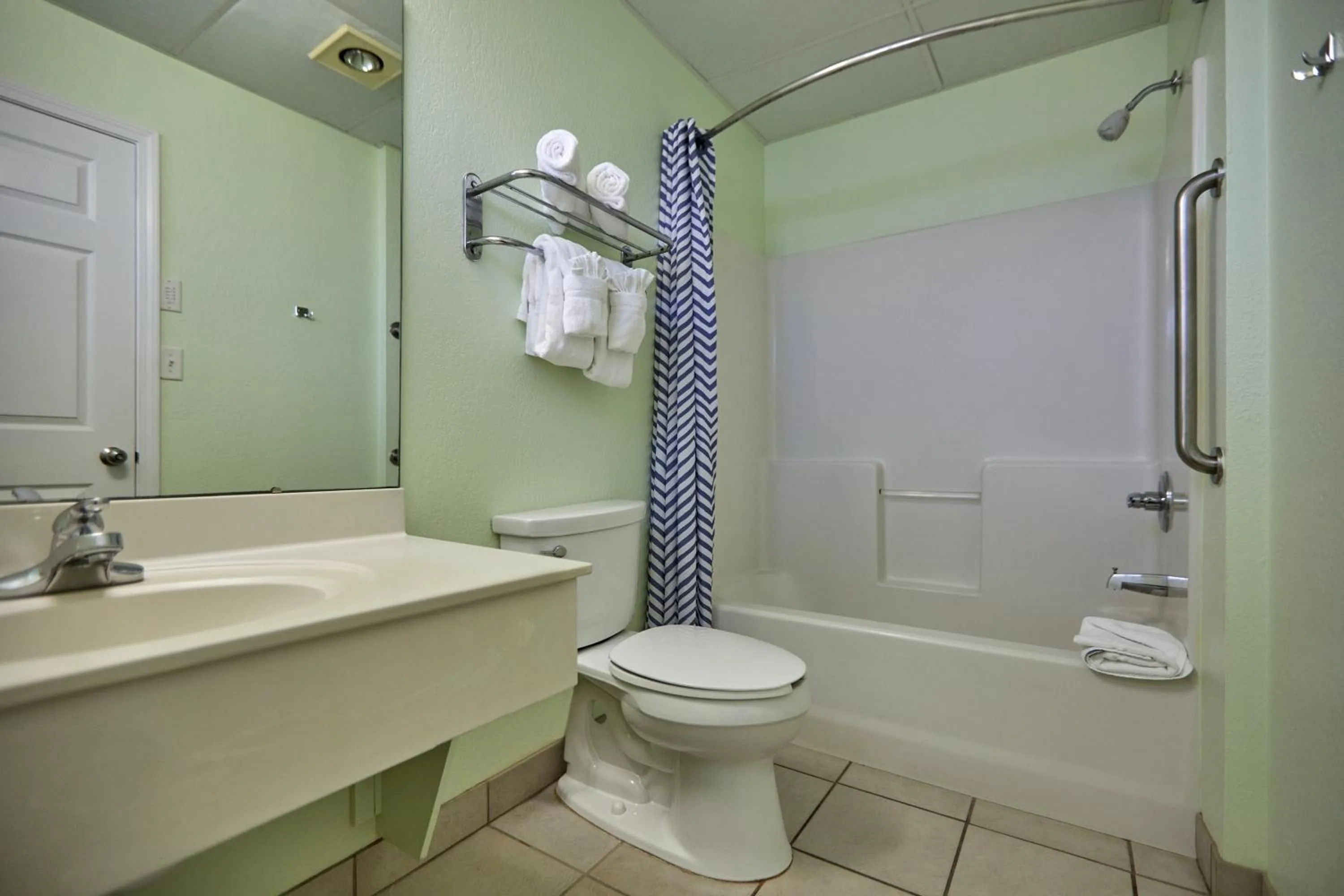 Bathroom in Palmetto Beachfront Hotel, a By The Sea Resort