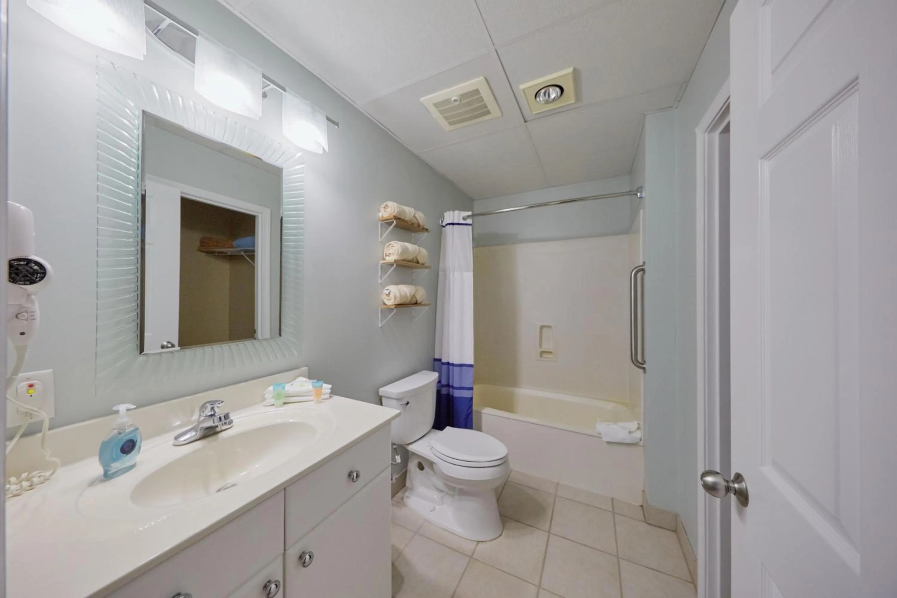 Shower in Palmetto Beachfront Hotel, a By The Sea Resort