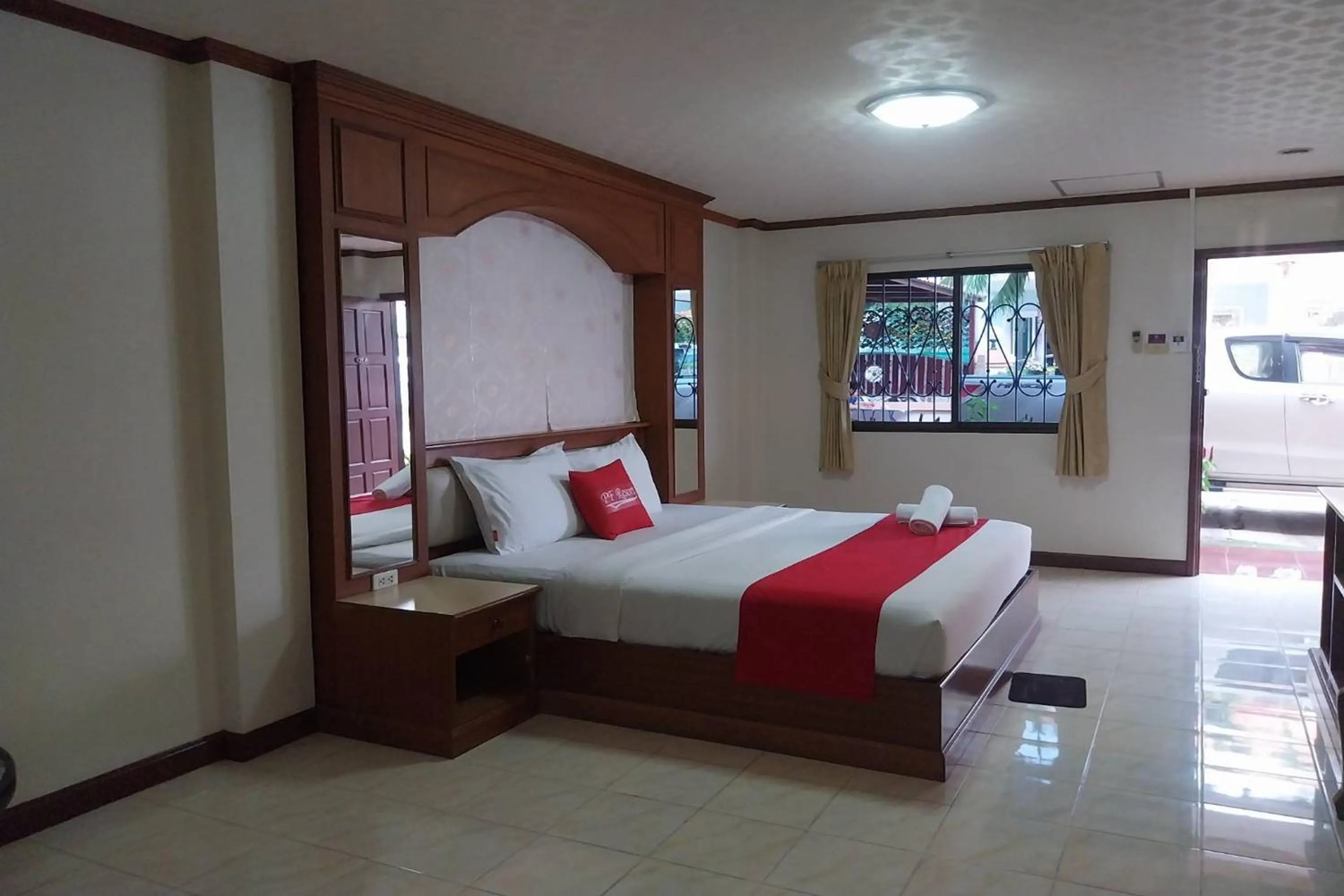 Photo of the whole room, Bed in PF Resort