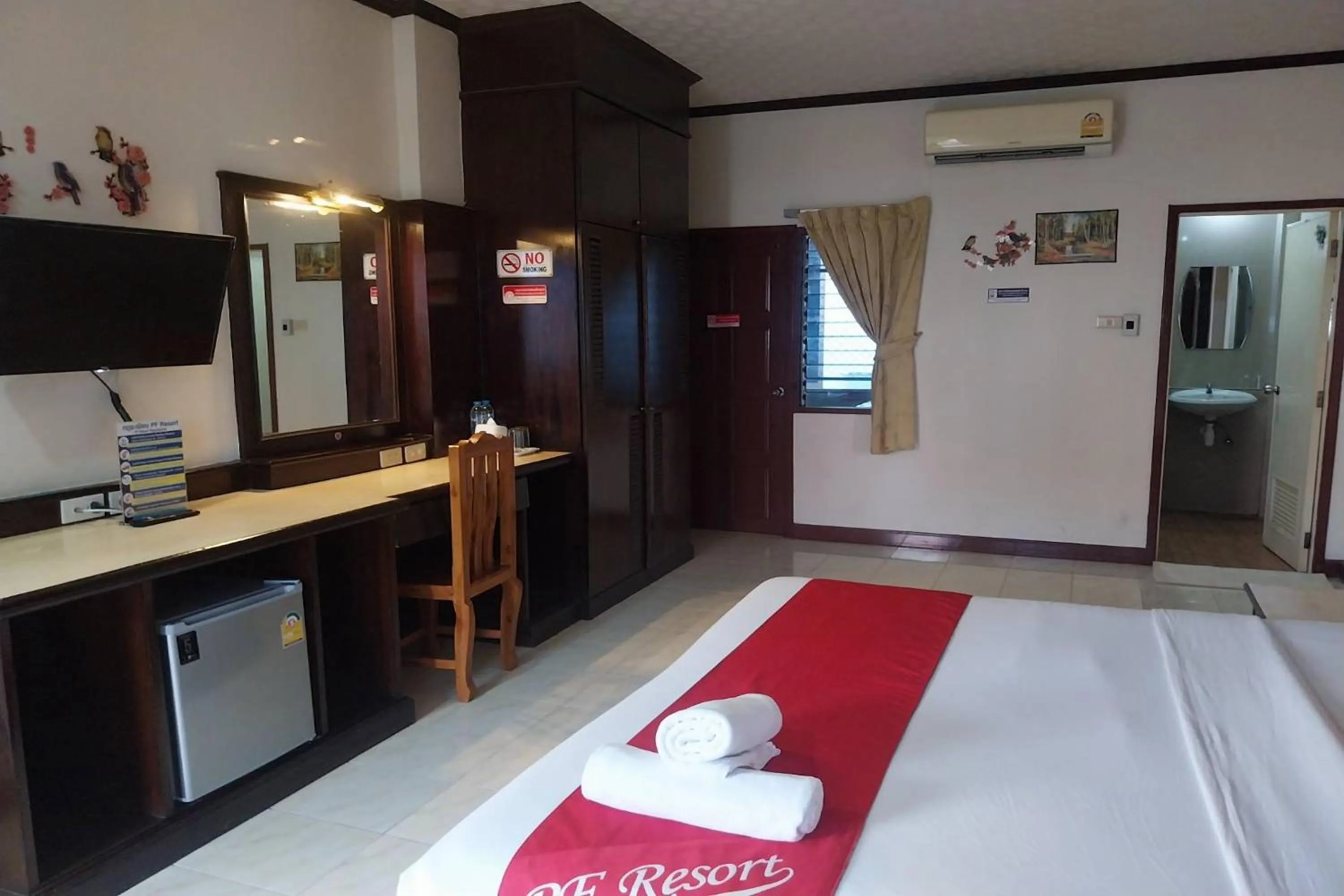 Photo of the whole room, Bed in PF Resort