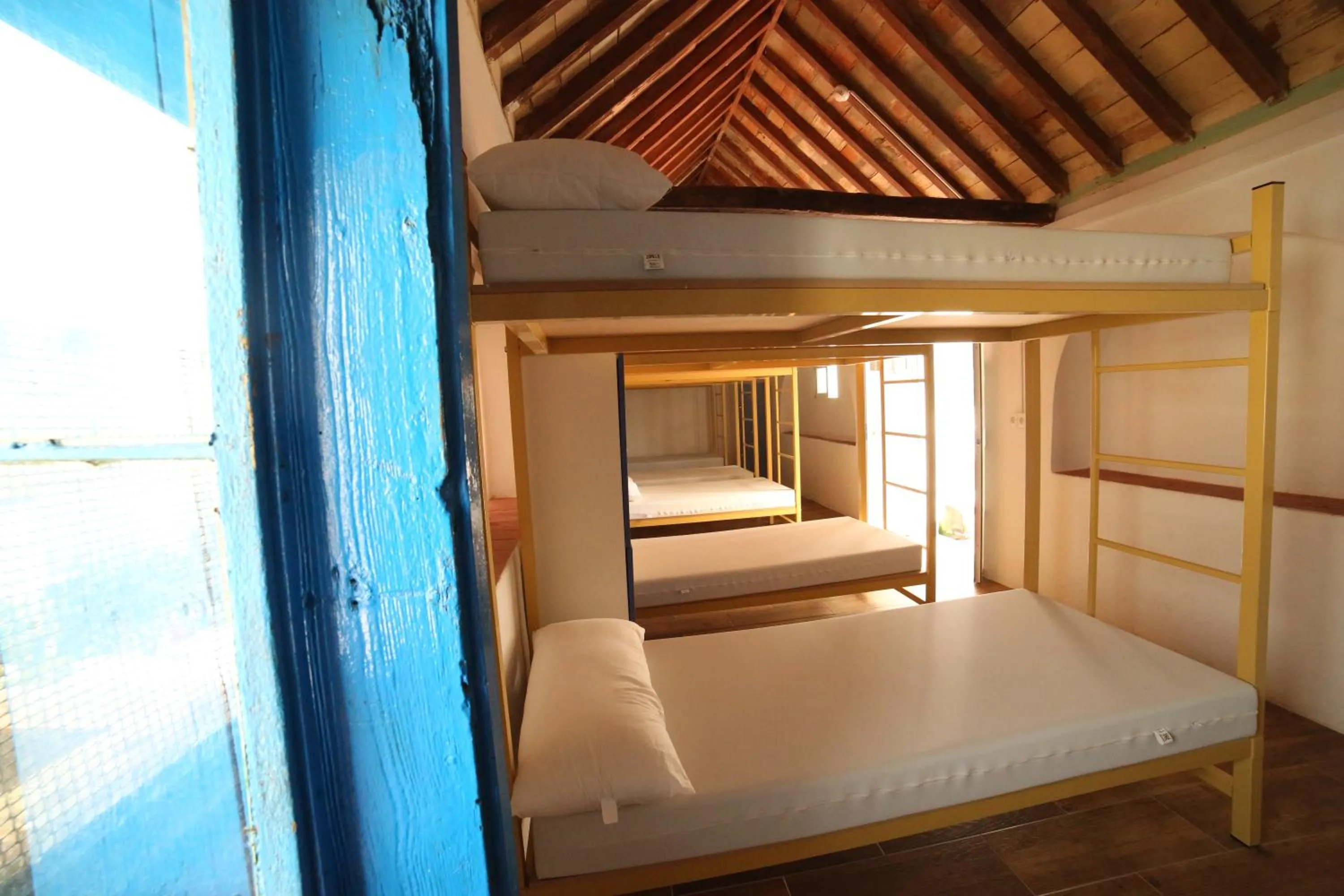 Bedroom, Bed in Wake up in Tarifa Hostel & Restaurant Lounge