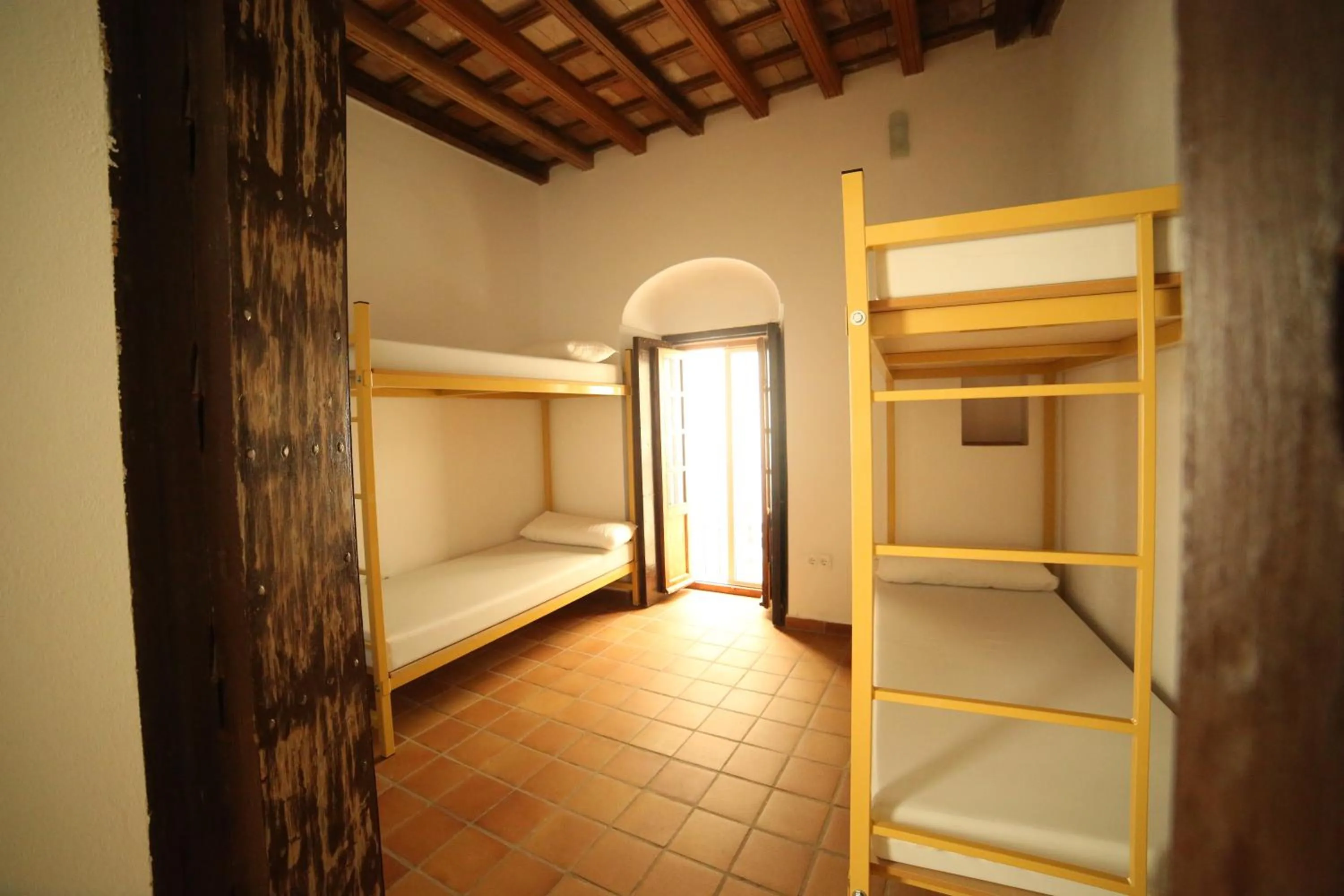 Bedroom, Bed in Wake up in Tarifa Hostel & Restaurant Lounge