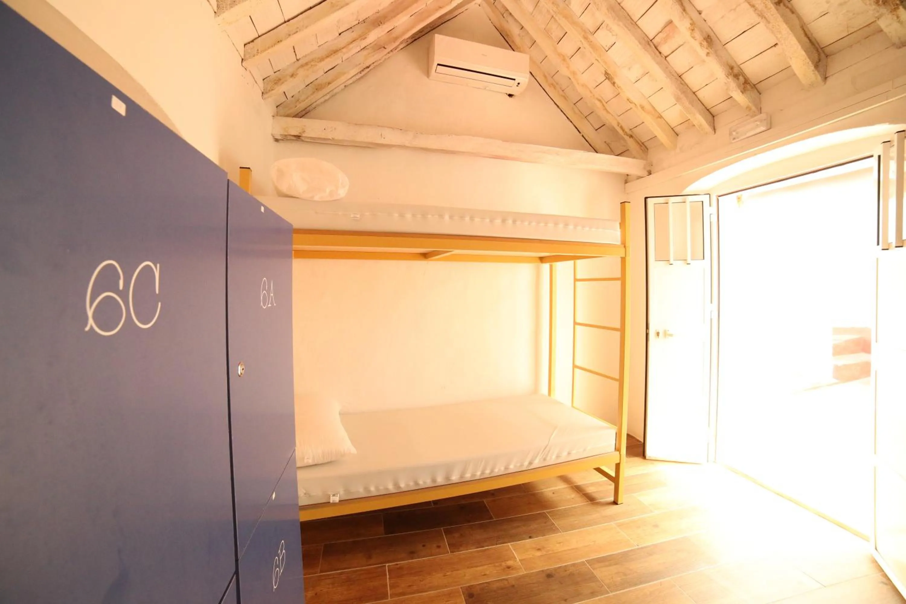 Bedroom, Bed in Wake up in Tarifa Hostel & Restaurant Lounge