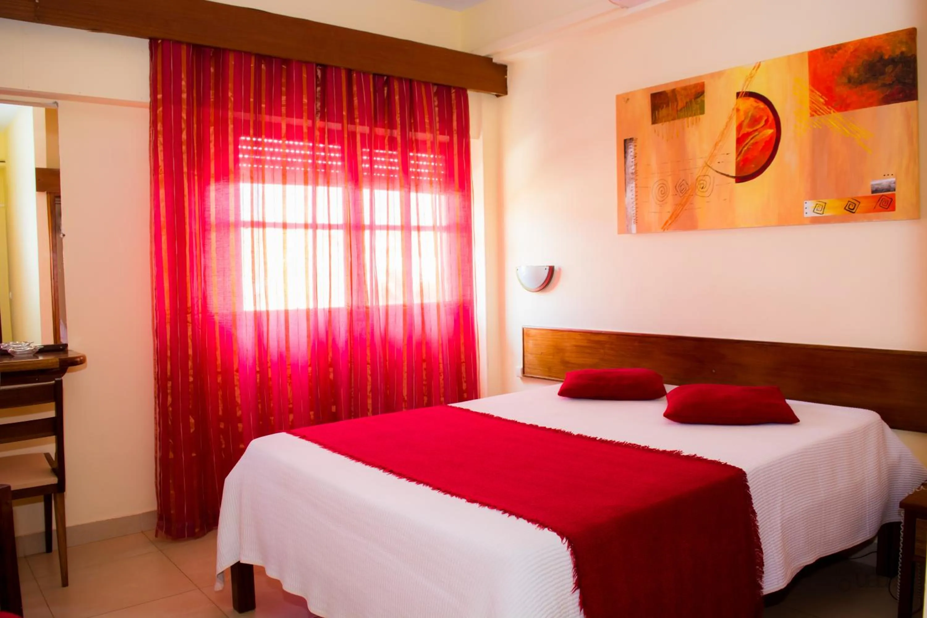 Bed in Aparthotel Avenida