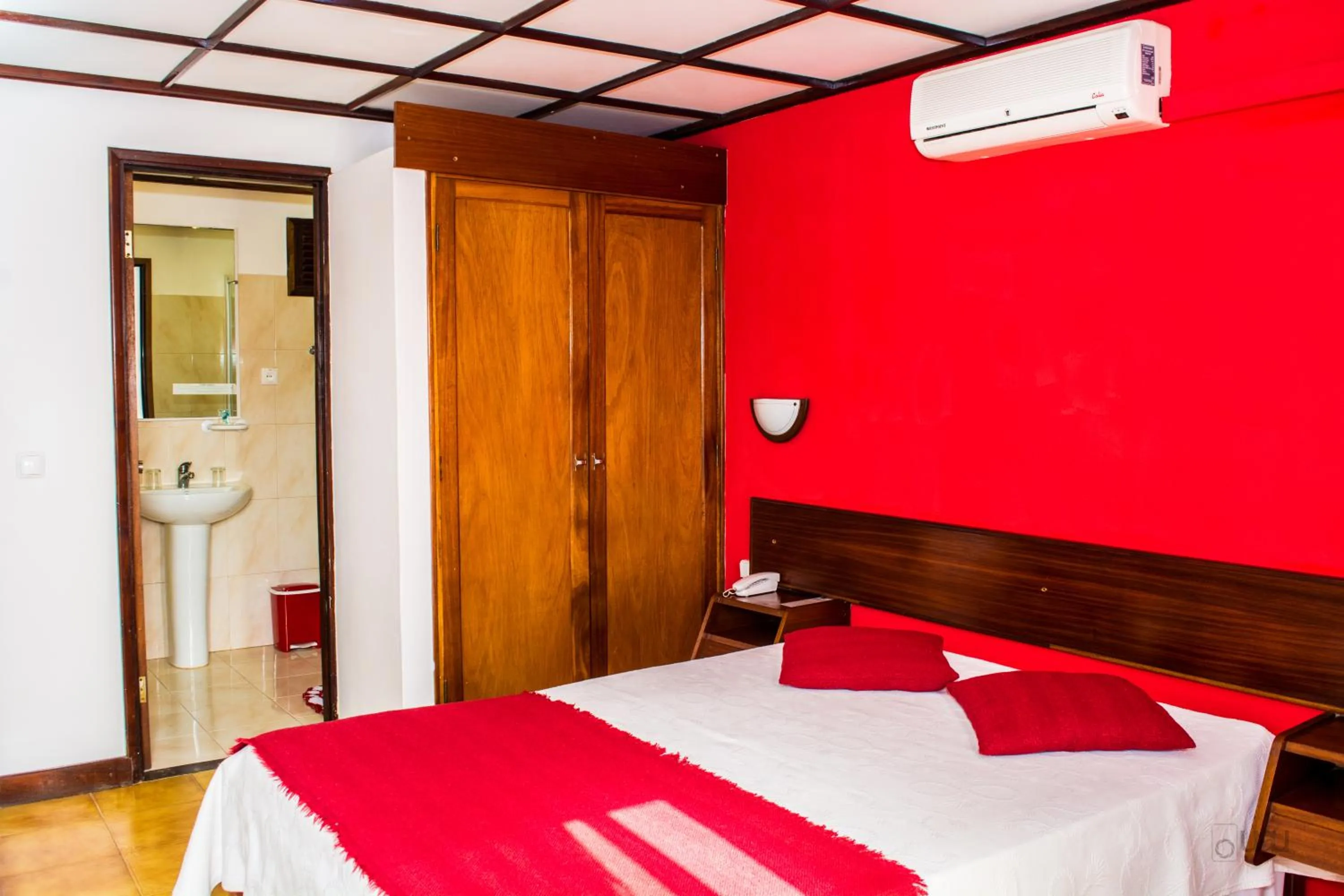 Bed in Aparthotel Avenida