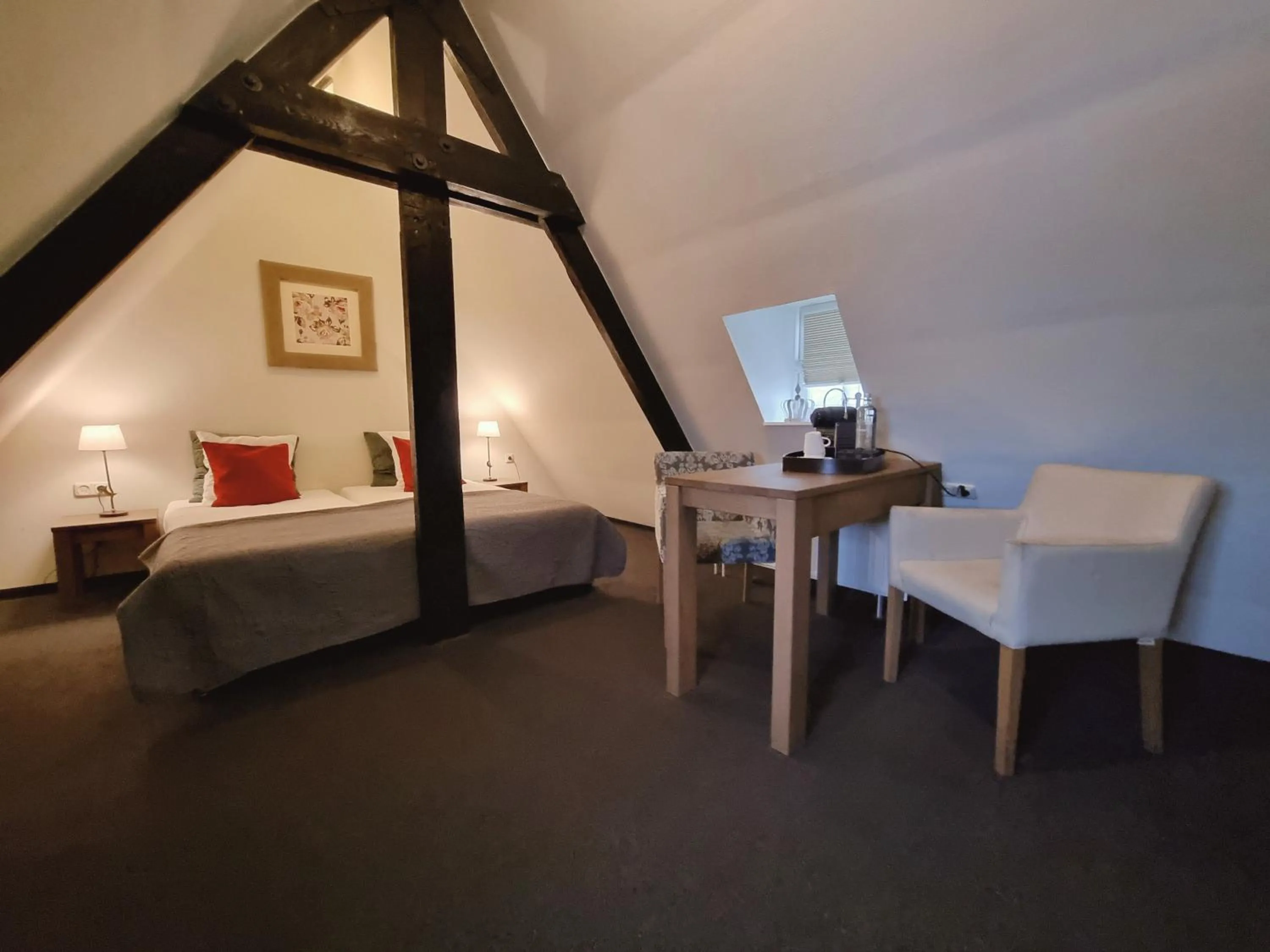 Seating area, Bed in Hotel Kasteel Doenrade
