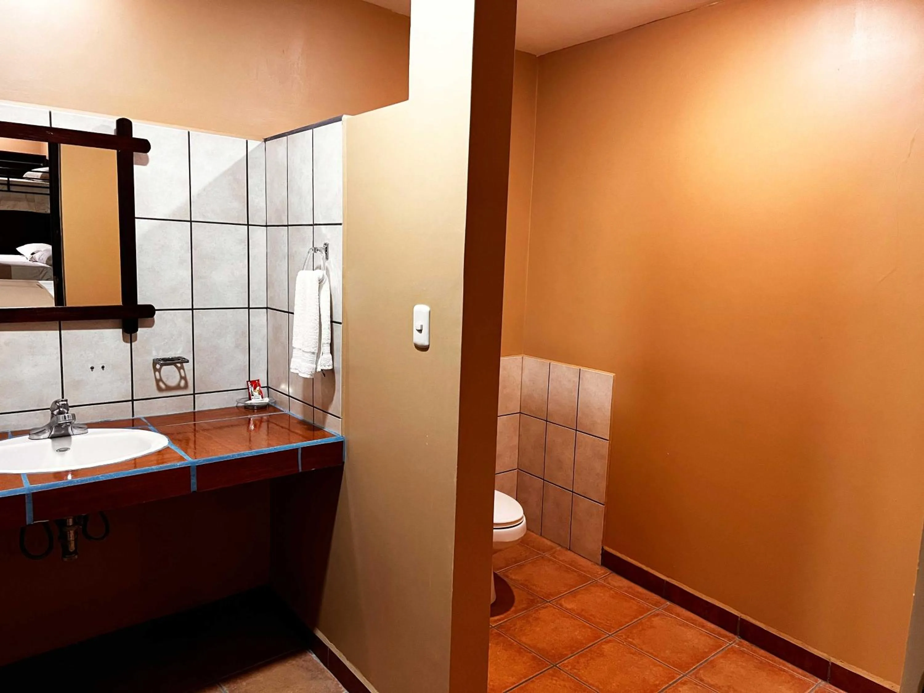 Bathroom in Belen Suites