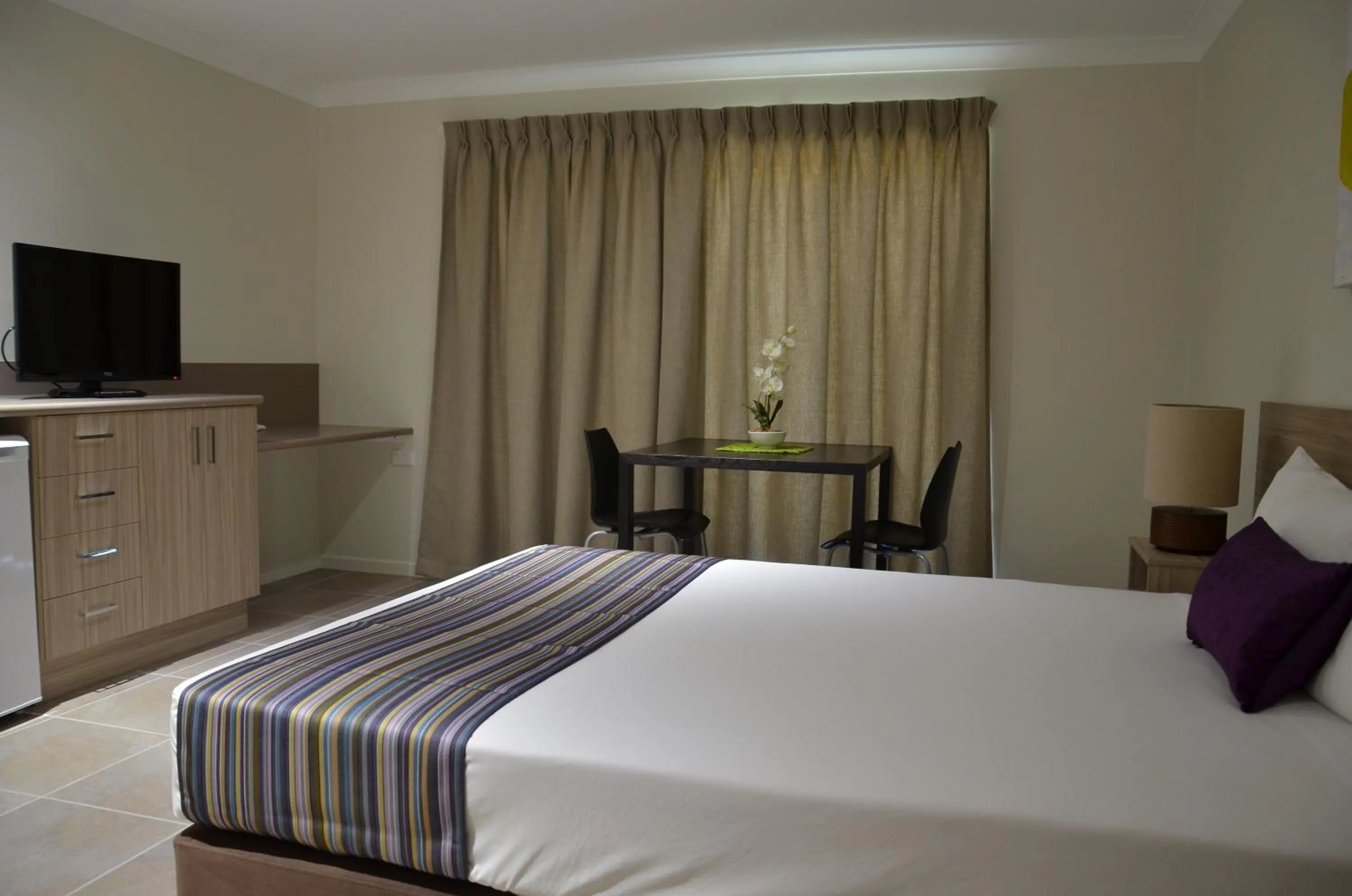 Bed in Beachside Boutique Motel Mackay