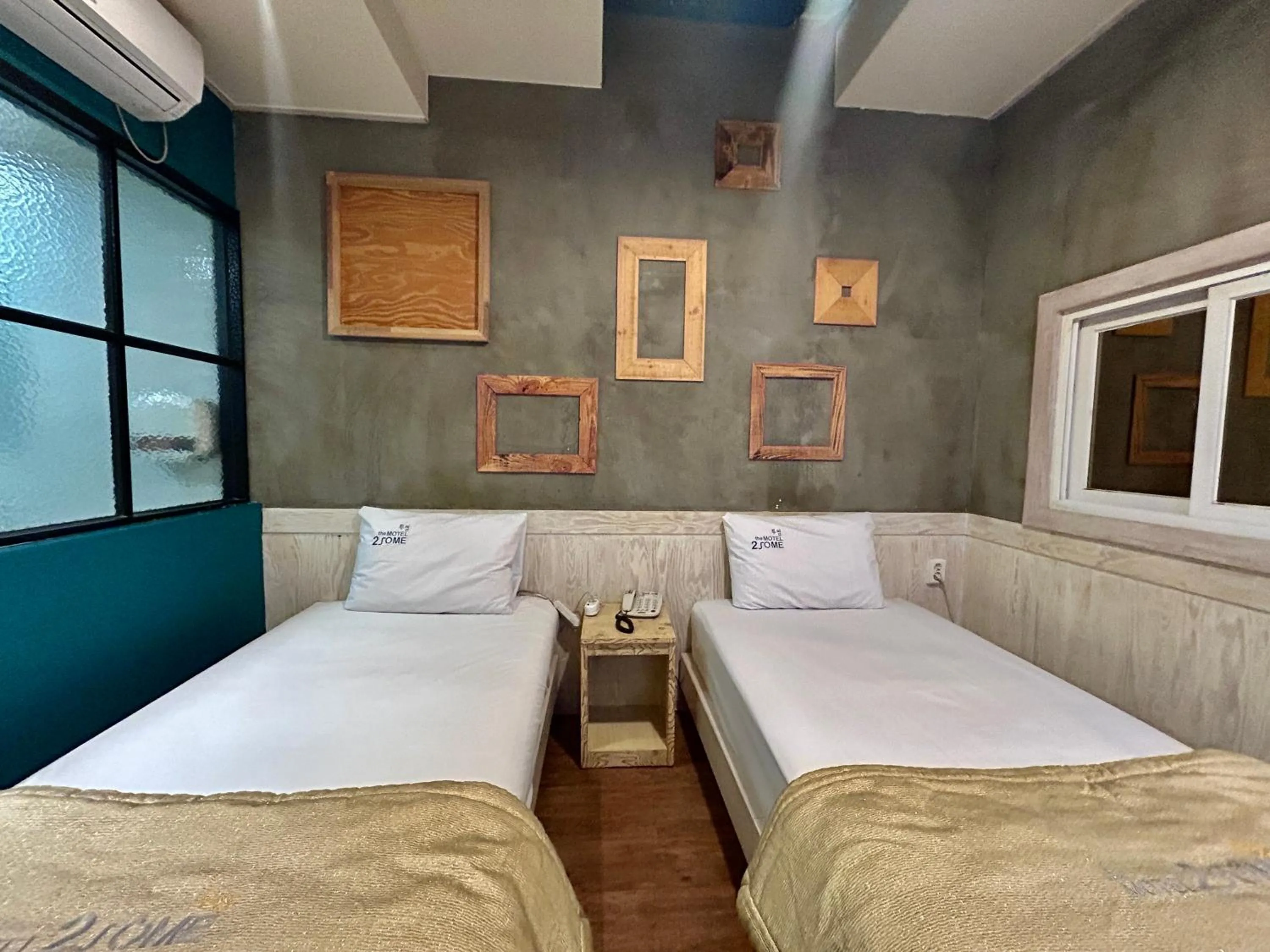 Bed in 2SOME Motel