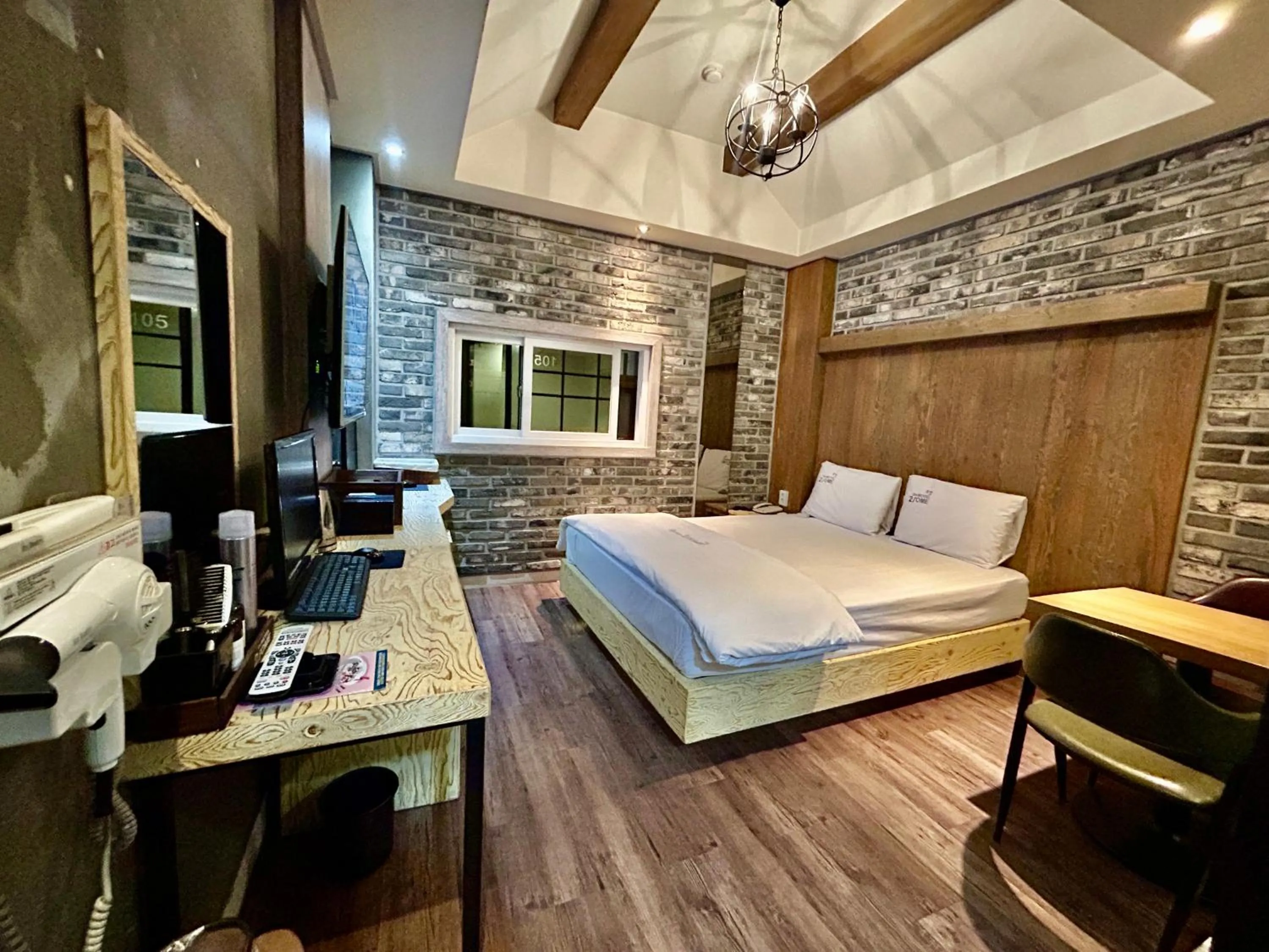 Bed in 2SOME Motel