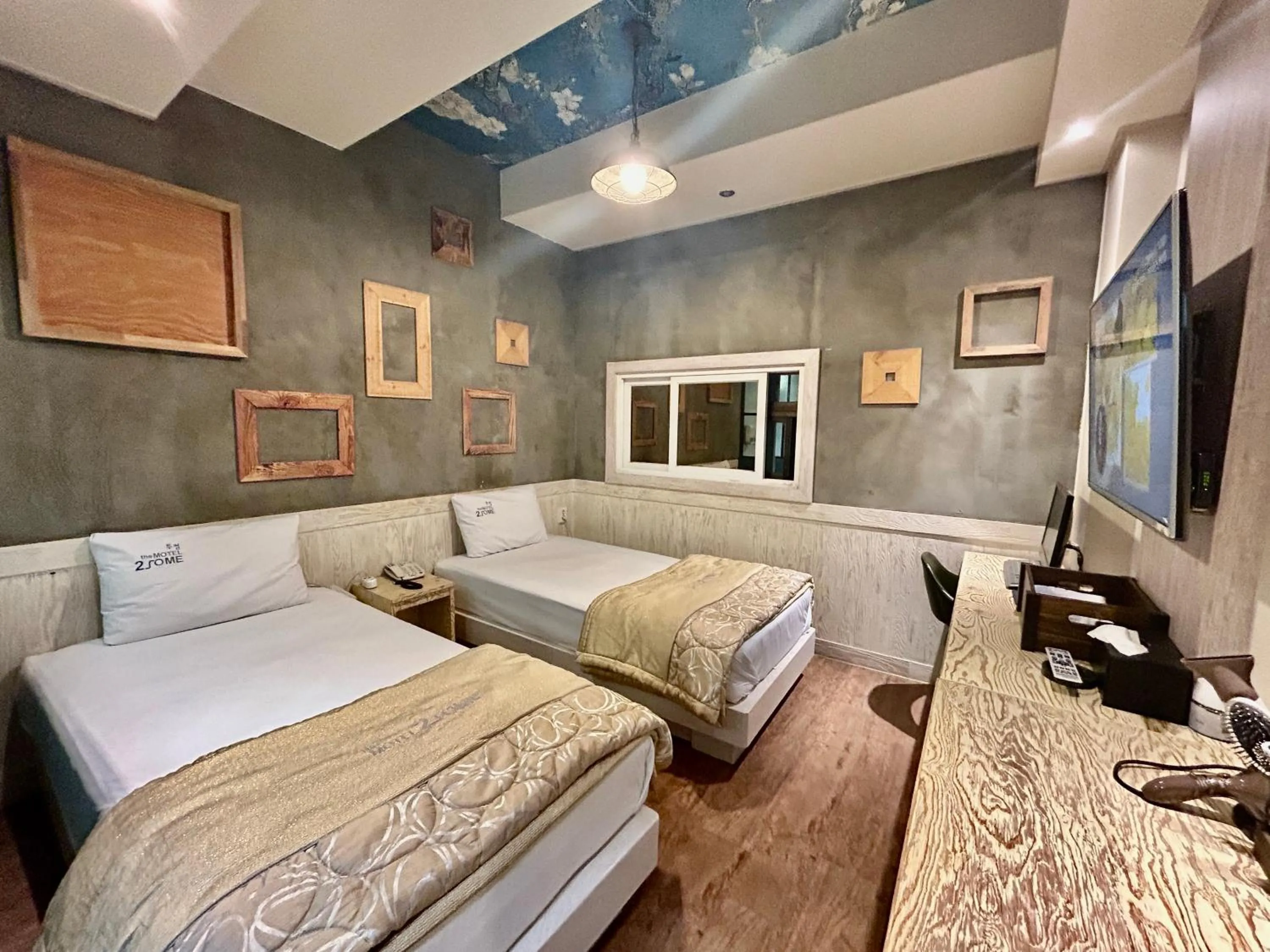 Bed in 2SOME Motel