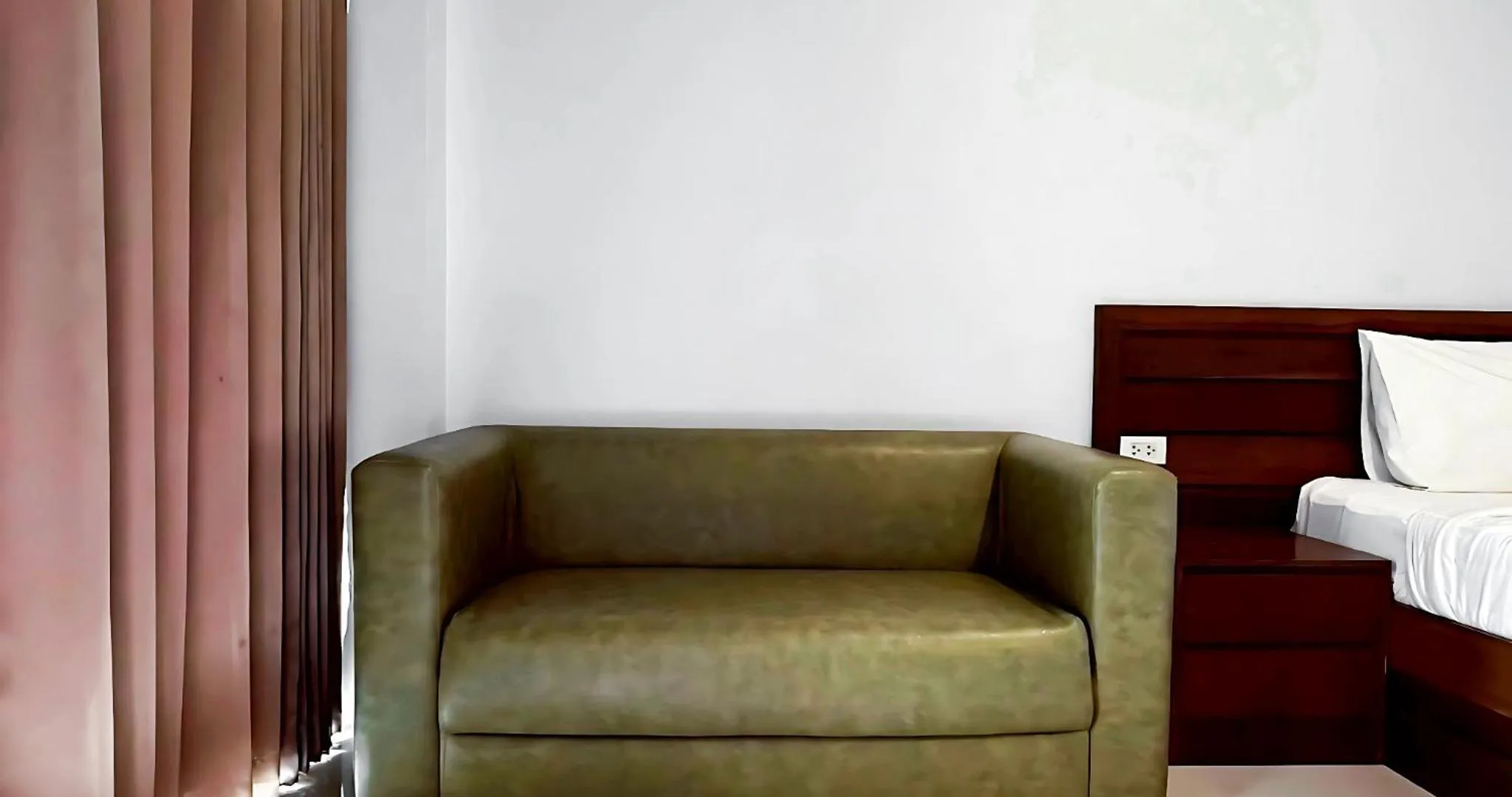 Seating area in Perfect Place Hotel