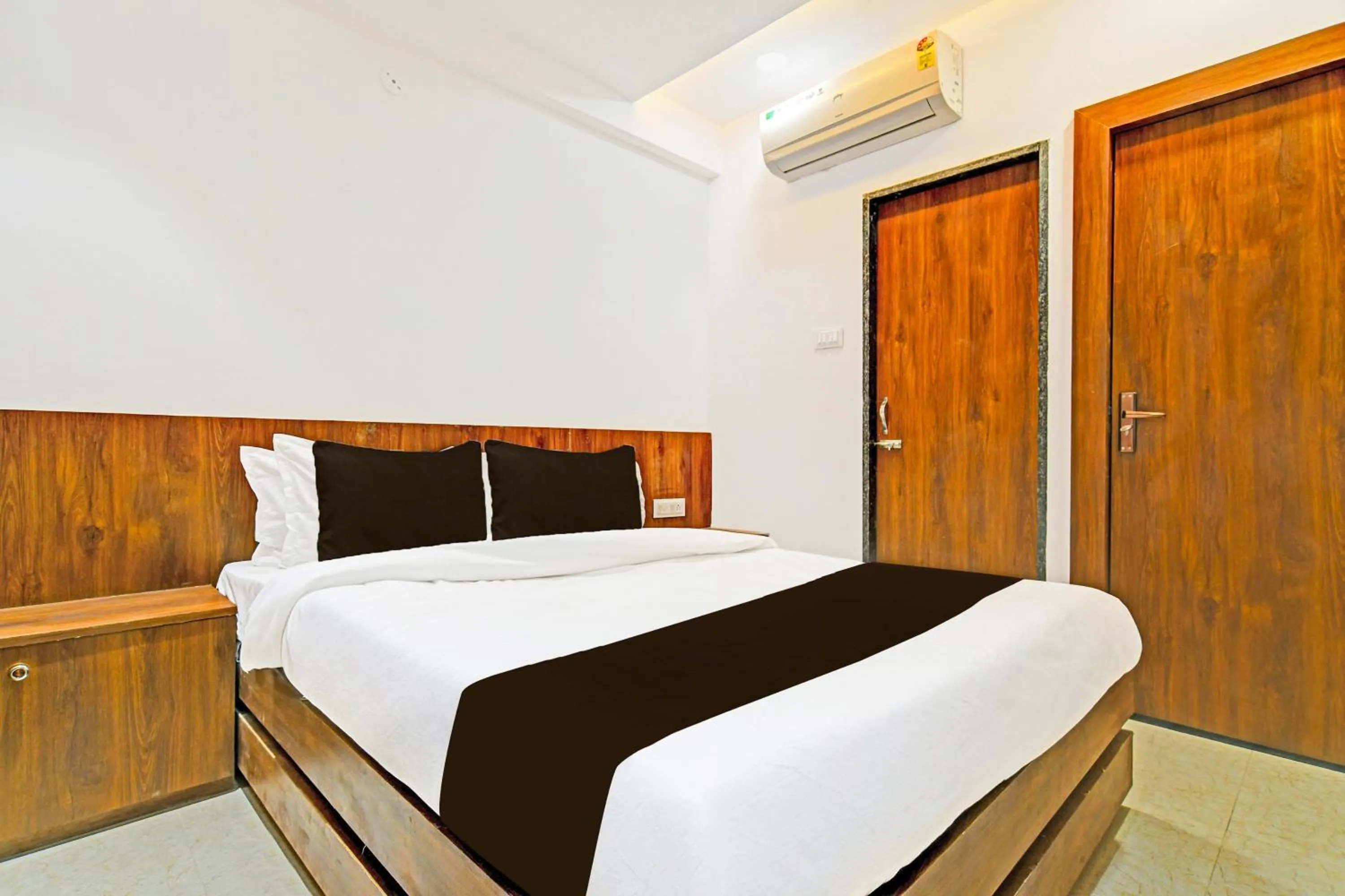 Bedroom in Hotel O Delight Stay