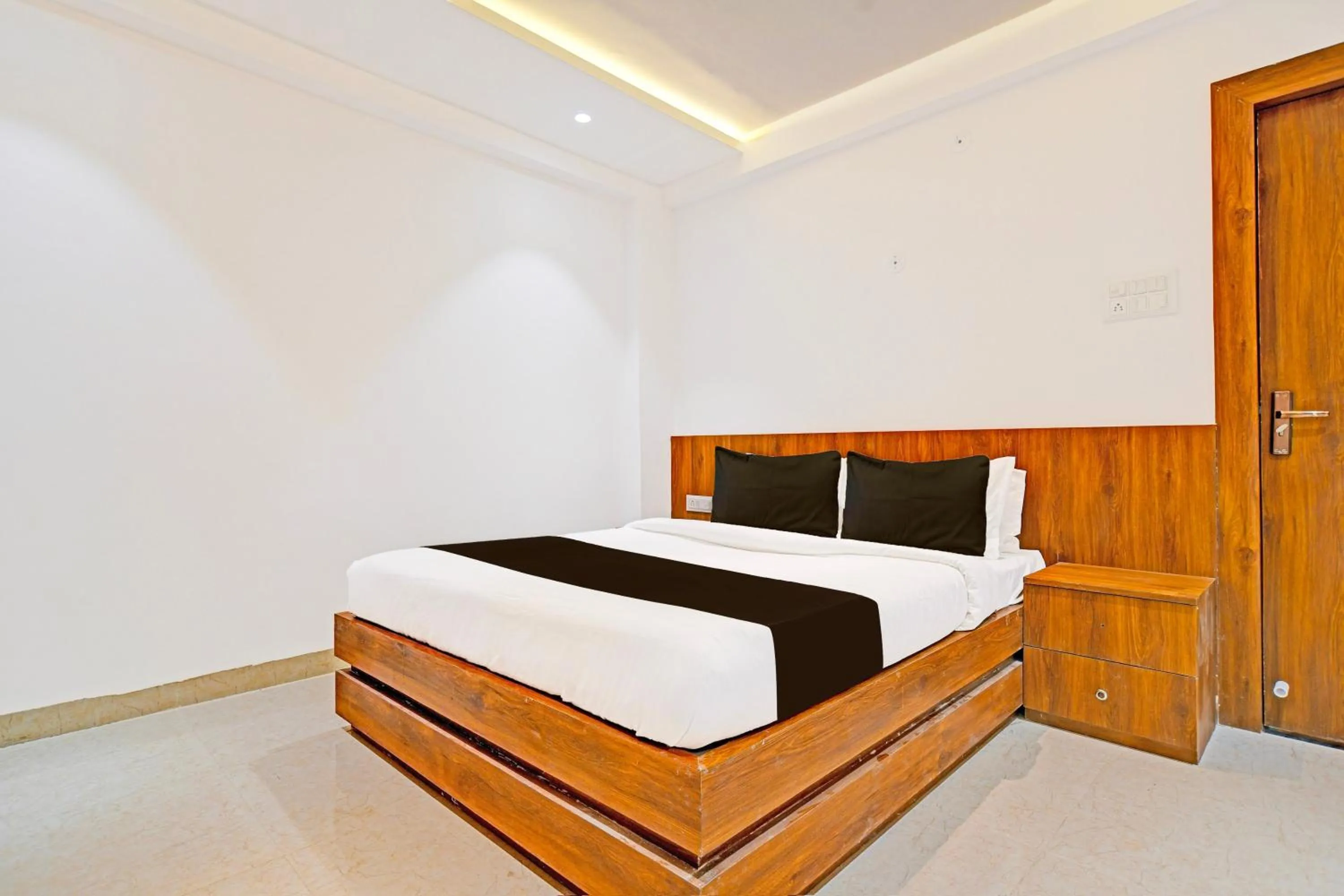 Bedroom in Hotel O Delight Stay