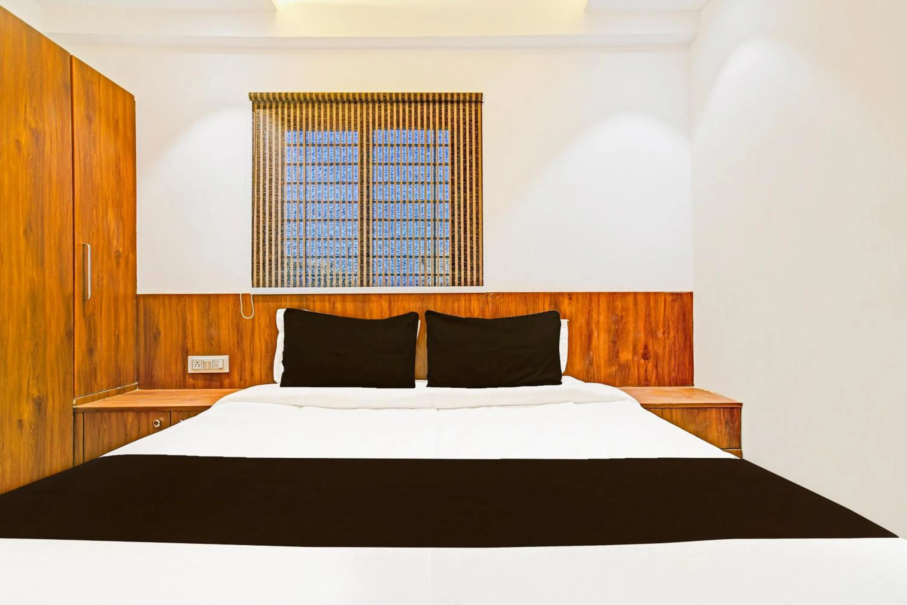 Bedroom in Hotel O Delight Stay