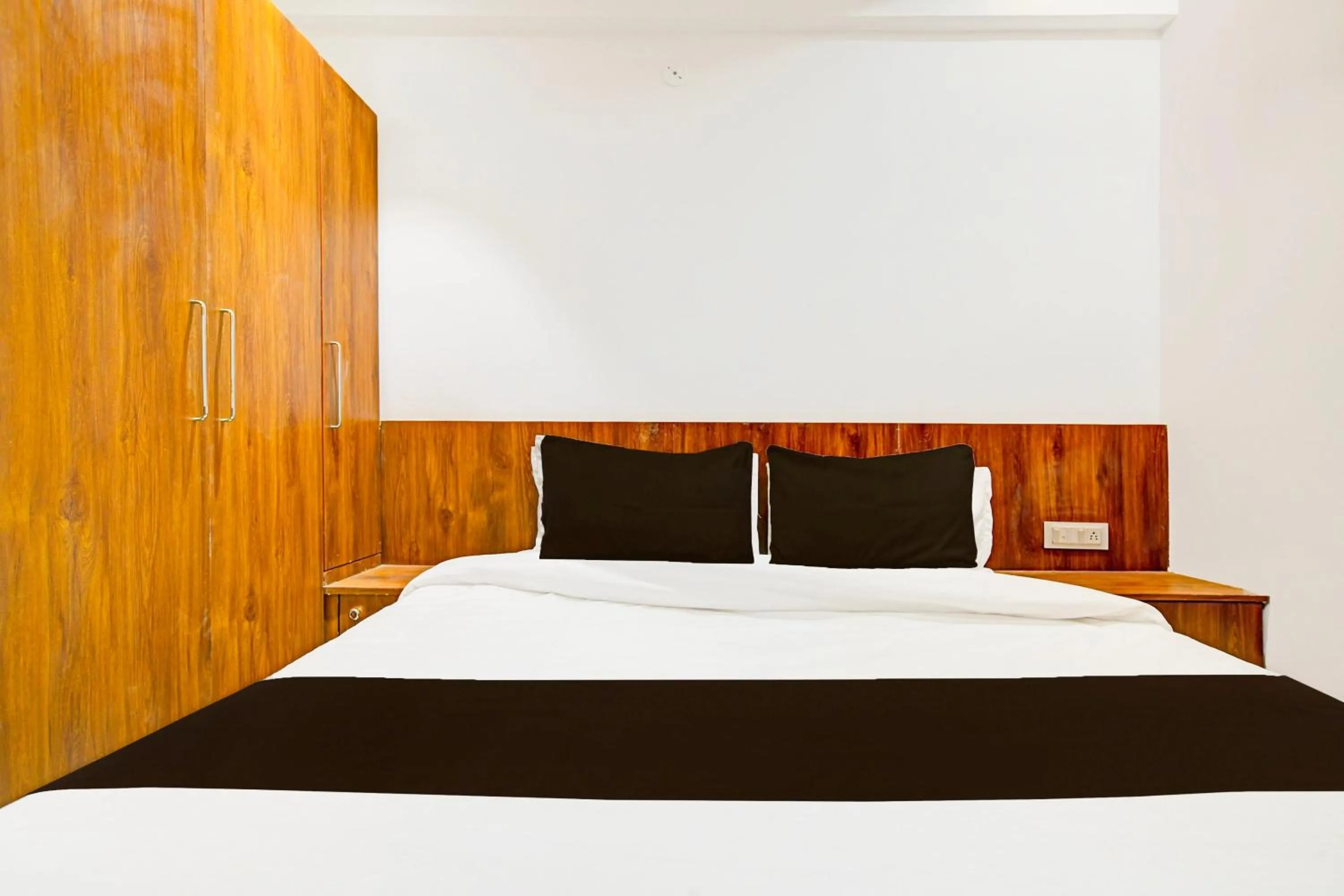 Bedroom in Hotel O Delight Stay